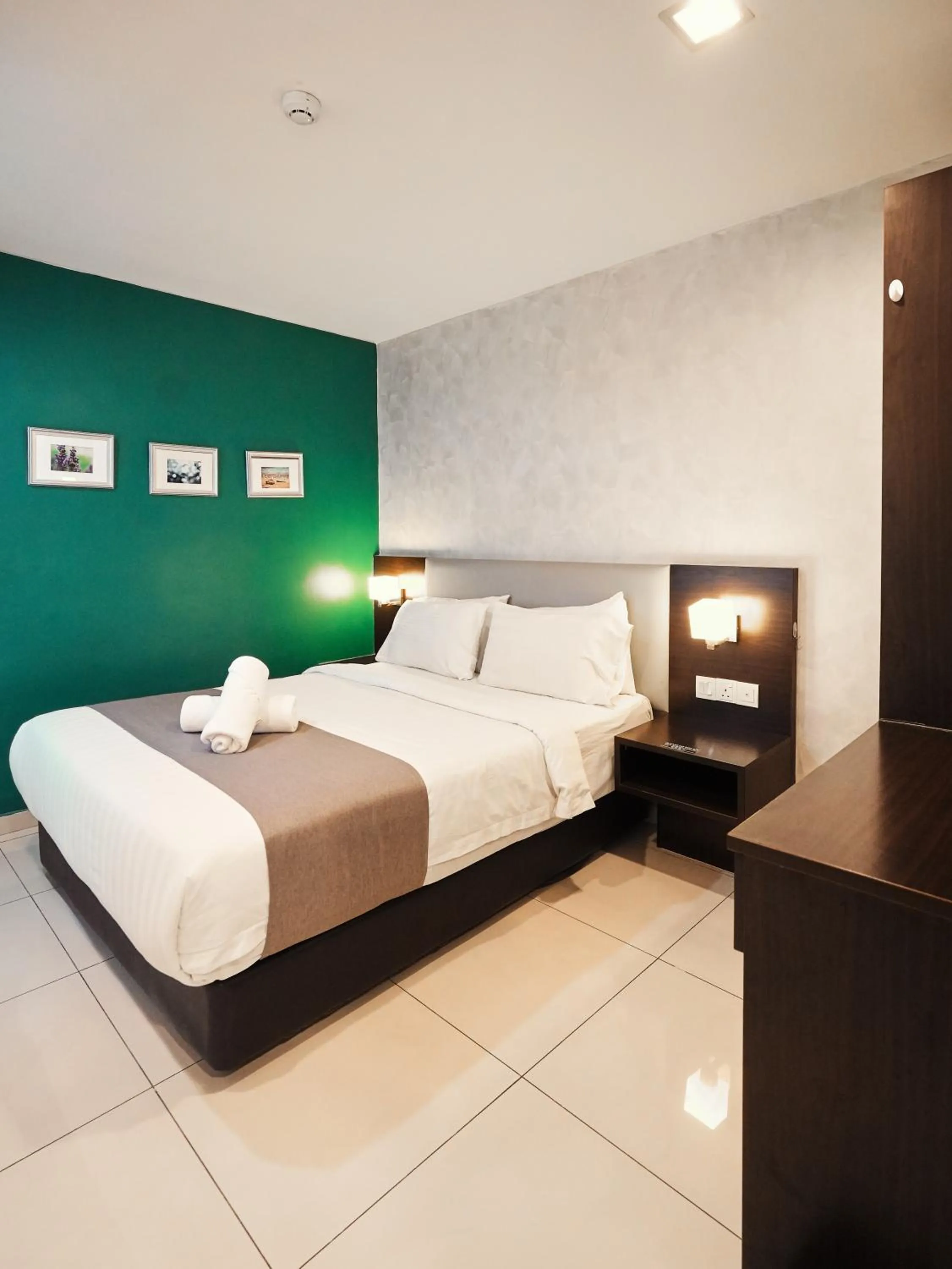 Bed in Eco Roomy Hotel