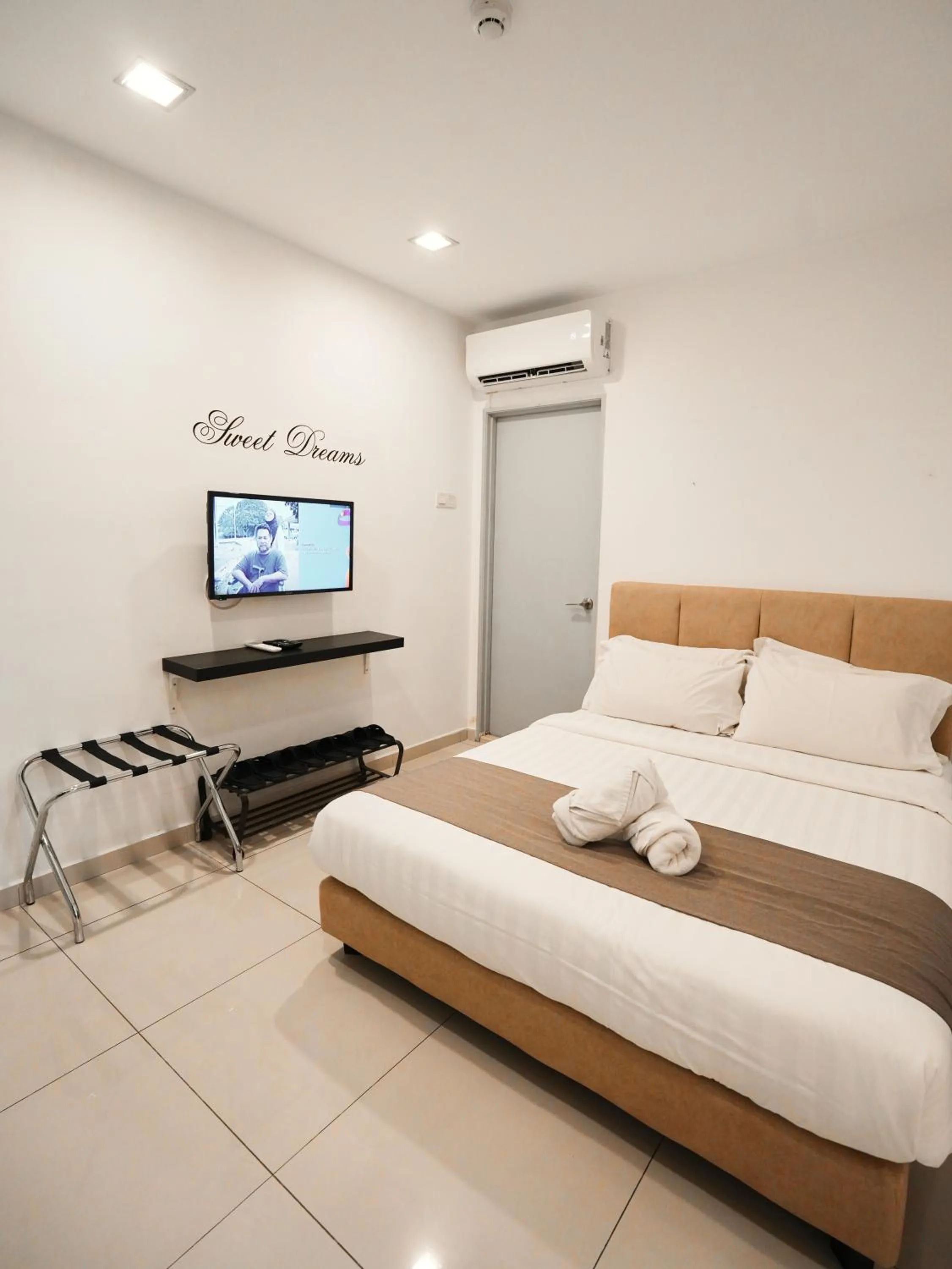 Bed in Eco Roomy Hotel