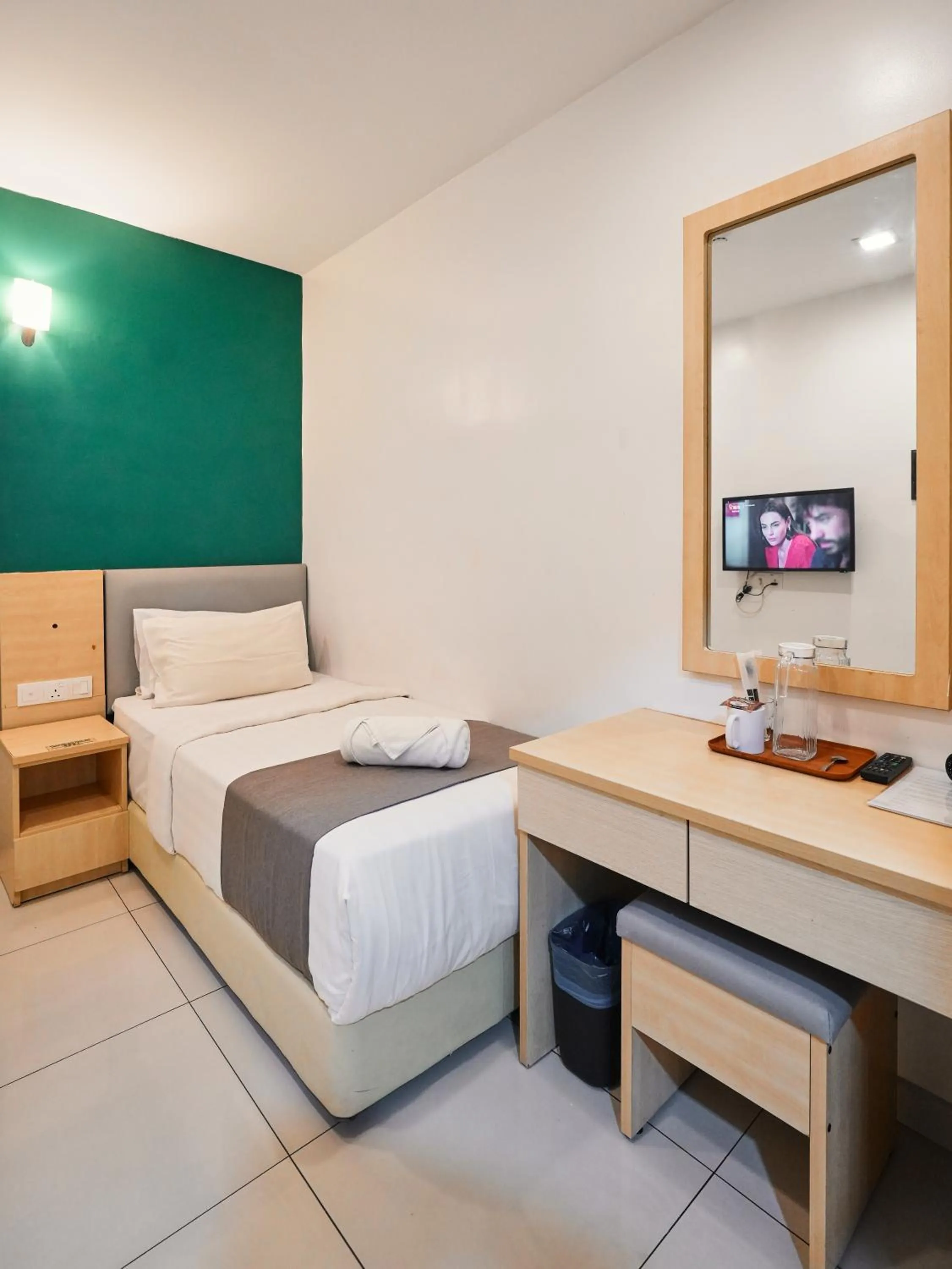 Bed in Eco Roomy Hotel