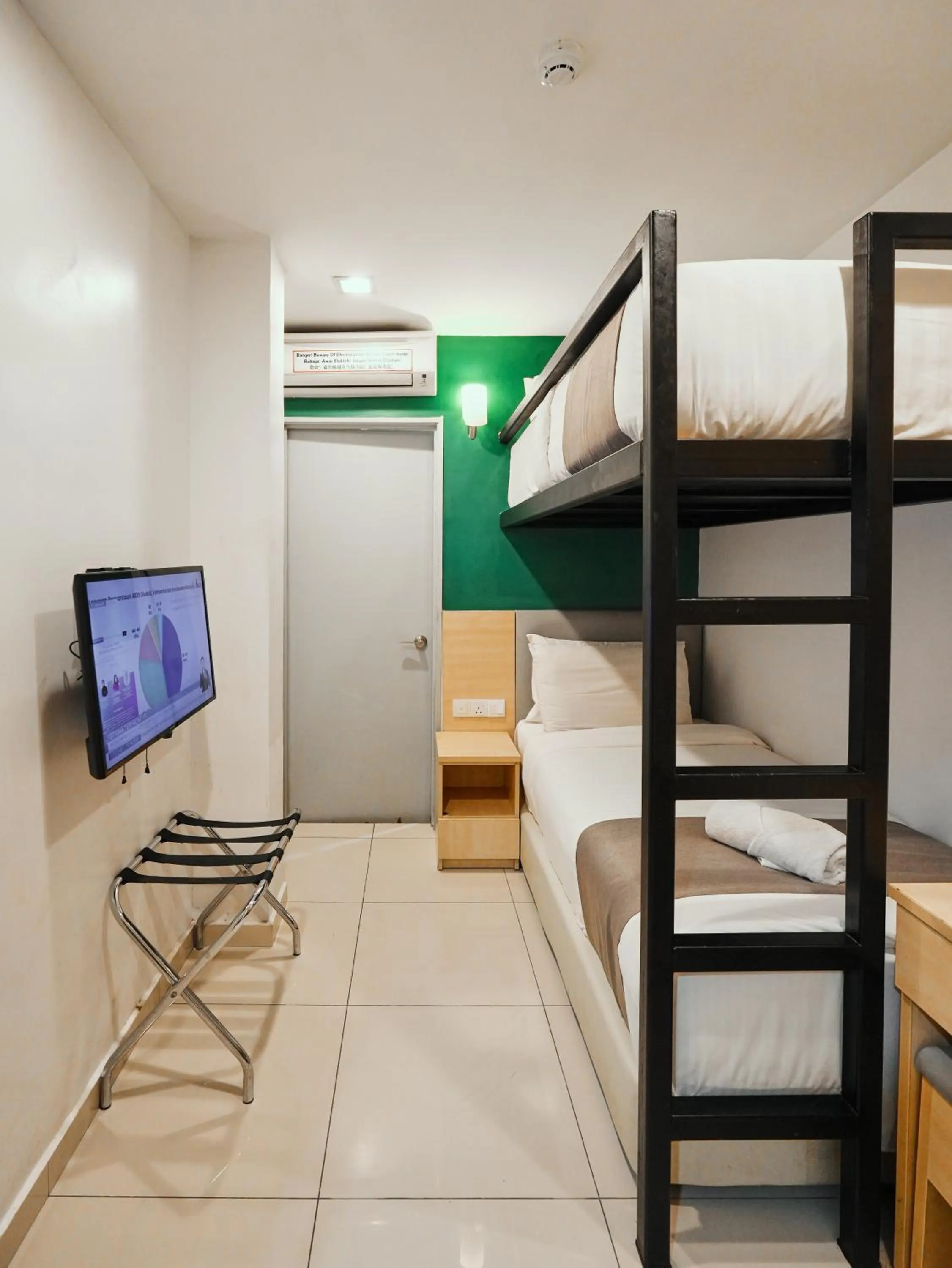 Bed in Eco Roomy Hotel