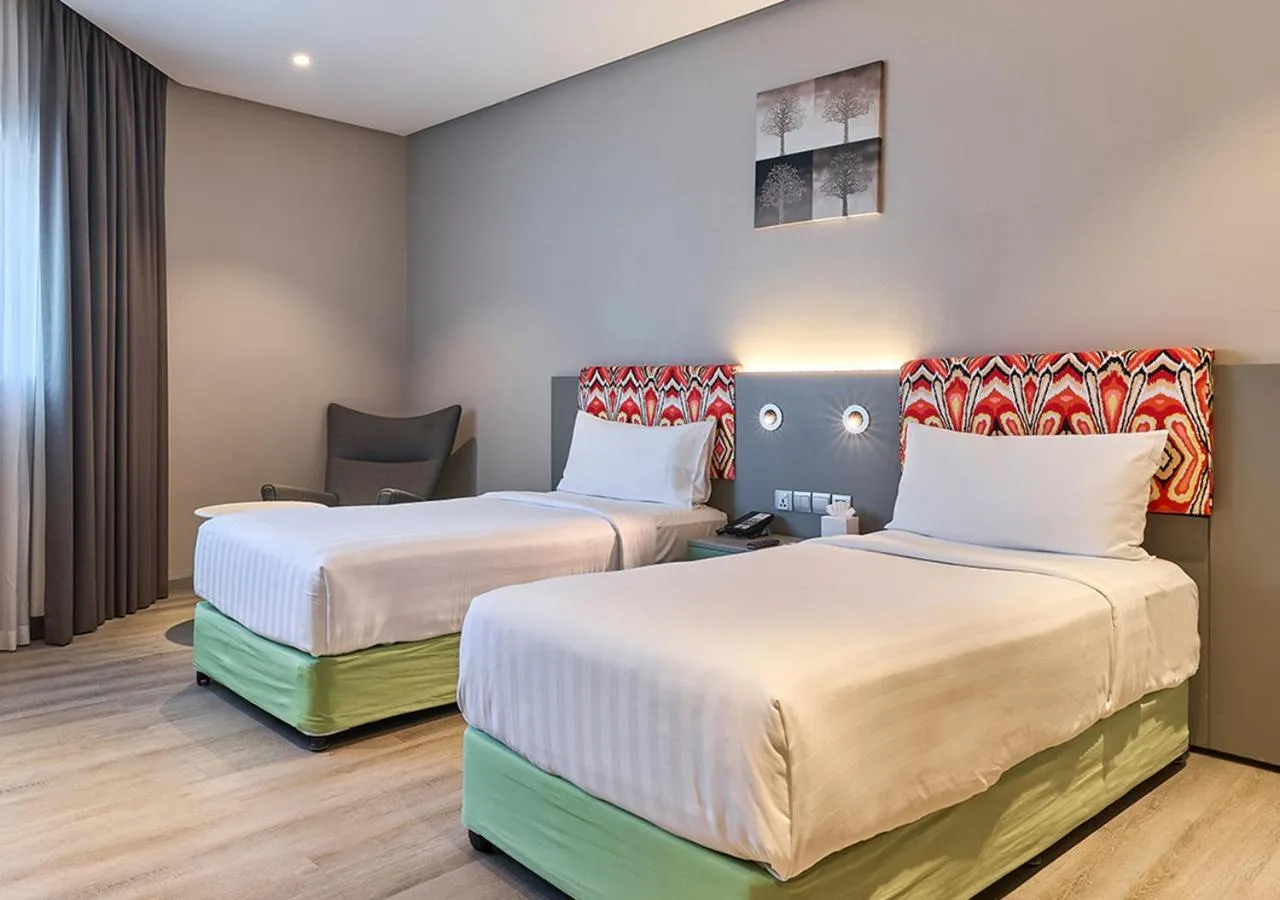 Bed in Ibis Styles Dubai Jumeira