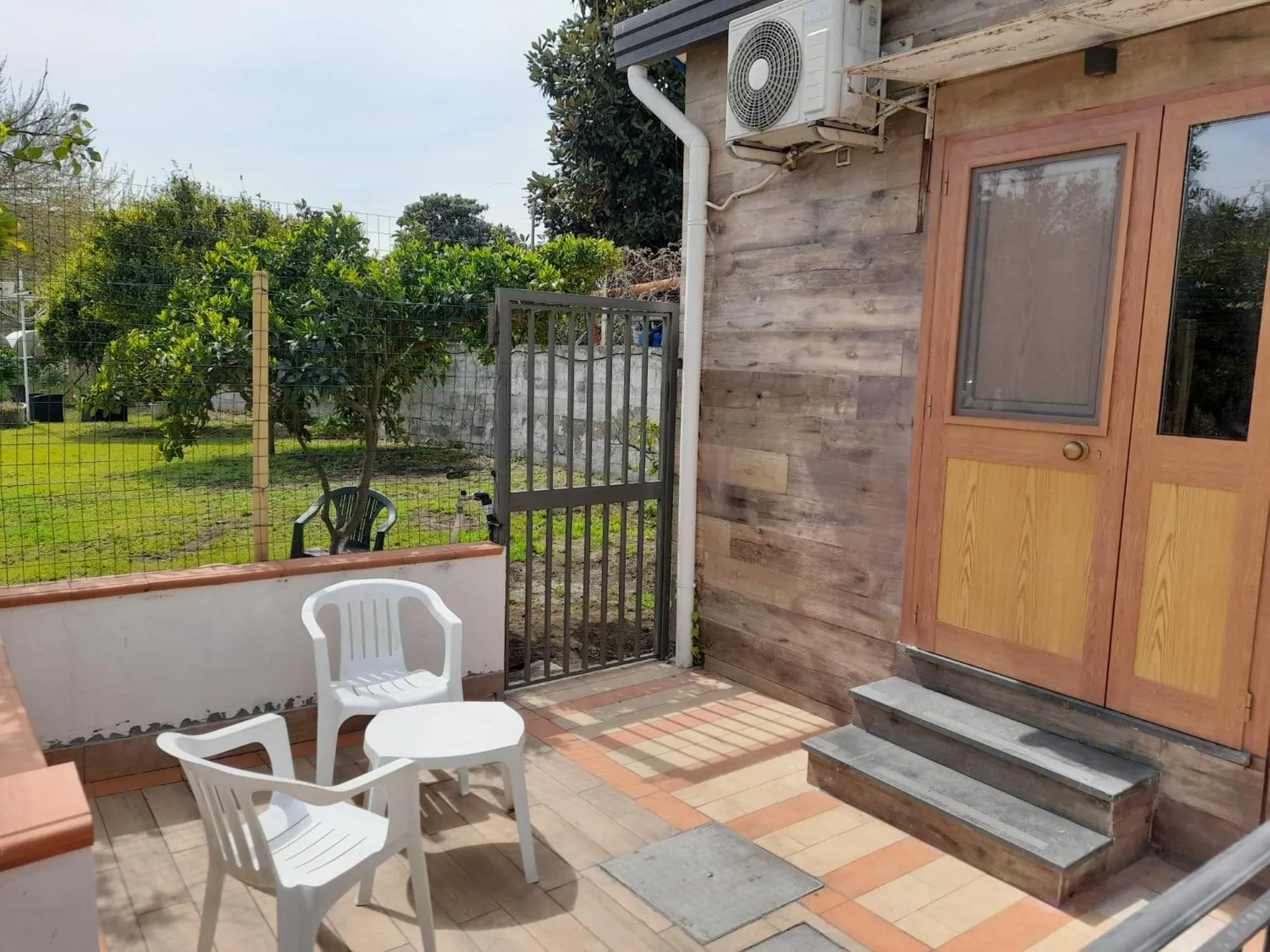 Patio in City Pompei Accommodations