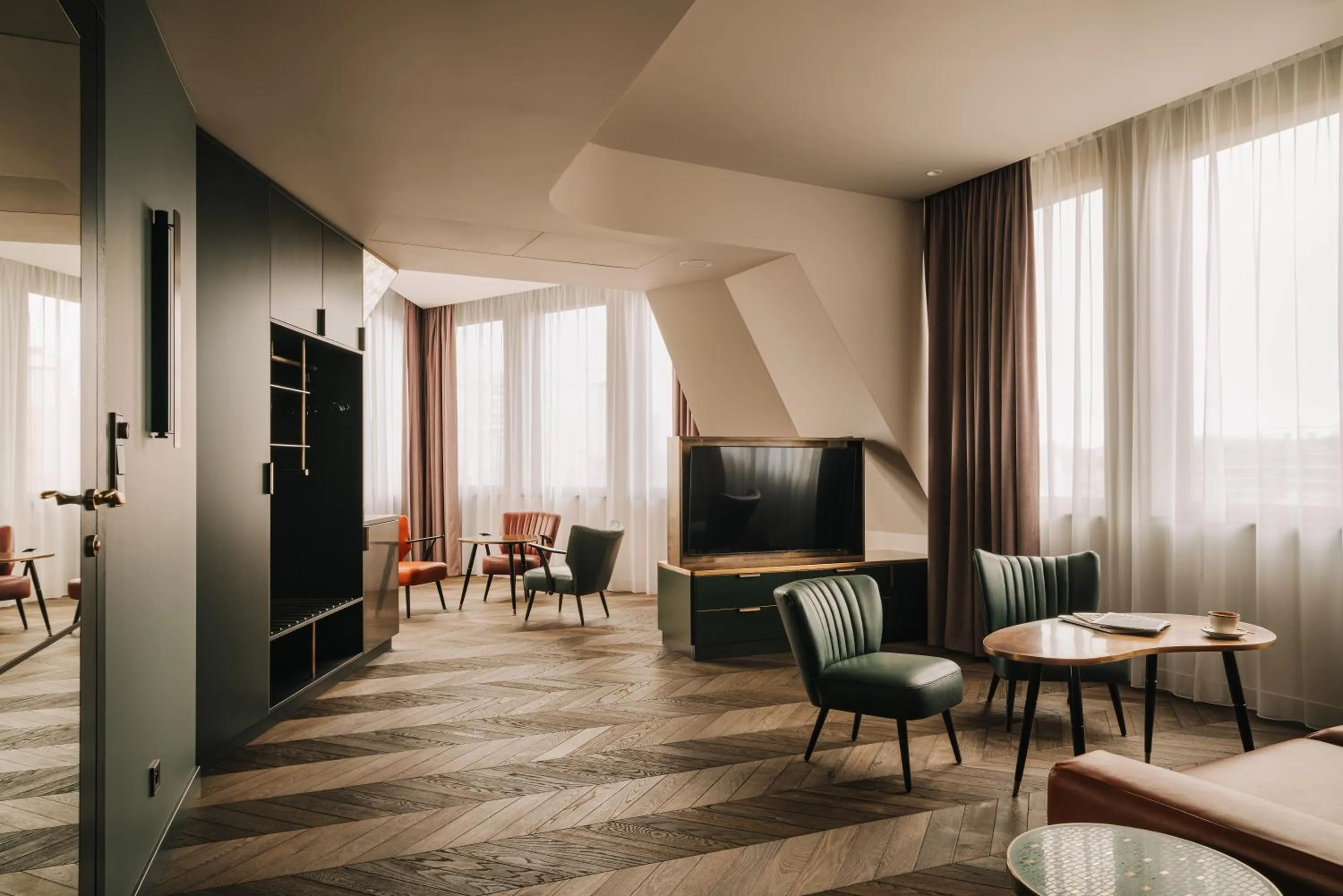 Communal lounge/ TV room in The Cyrus Hotel