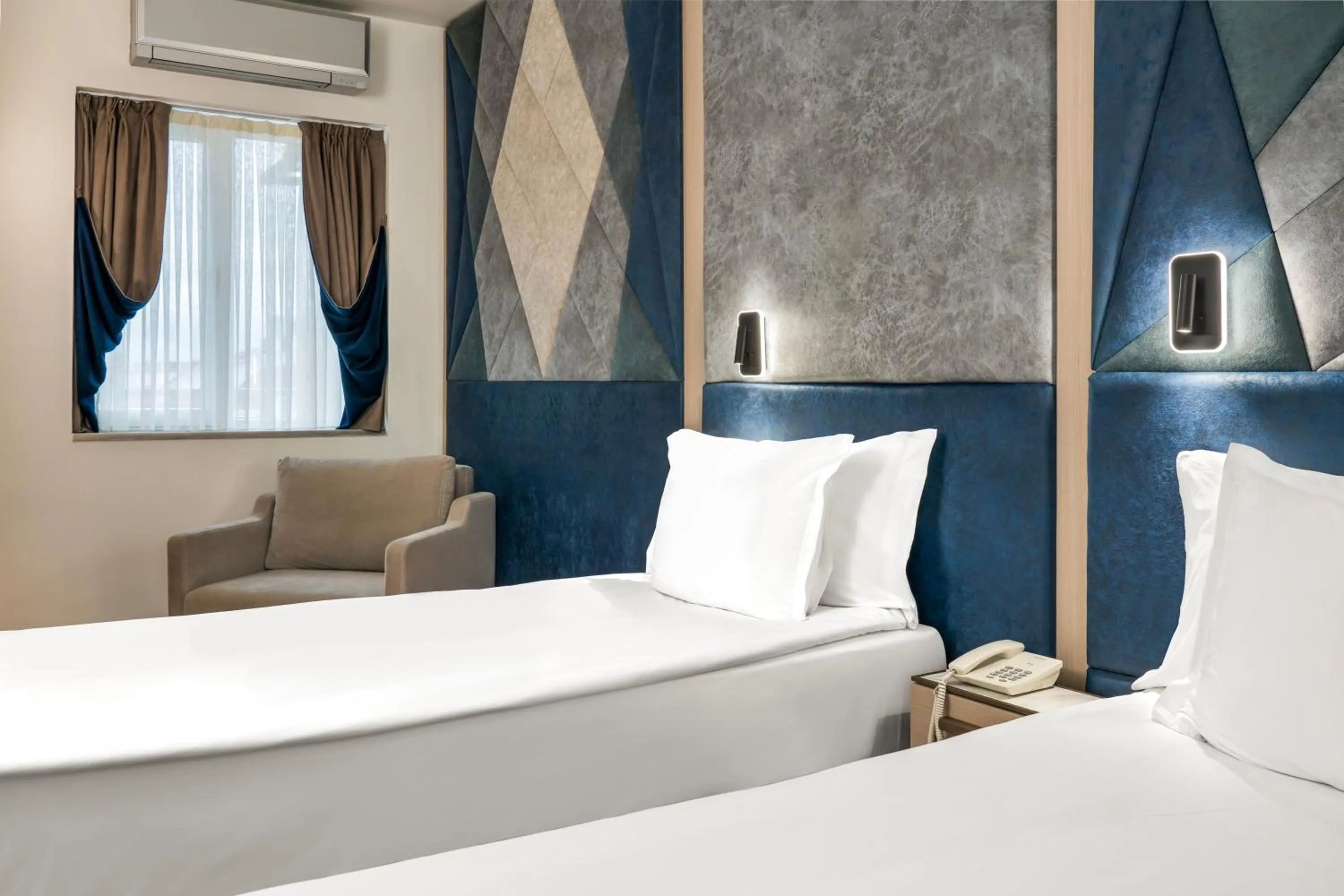 Bed in Adamar Hotel-Special Category