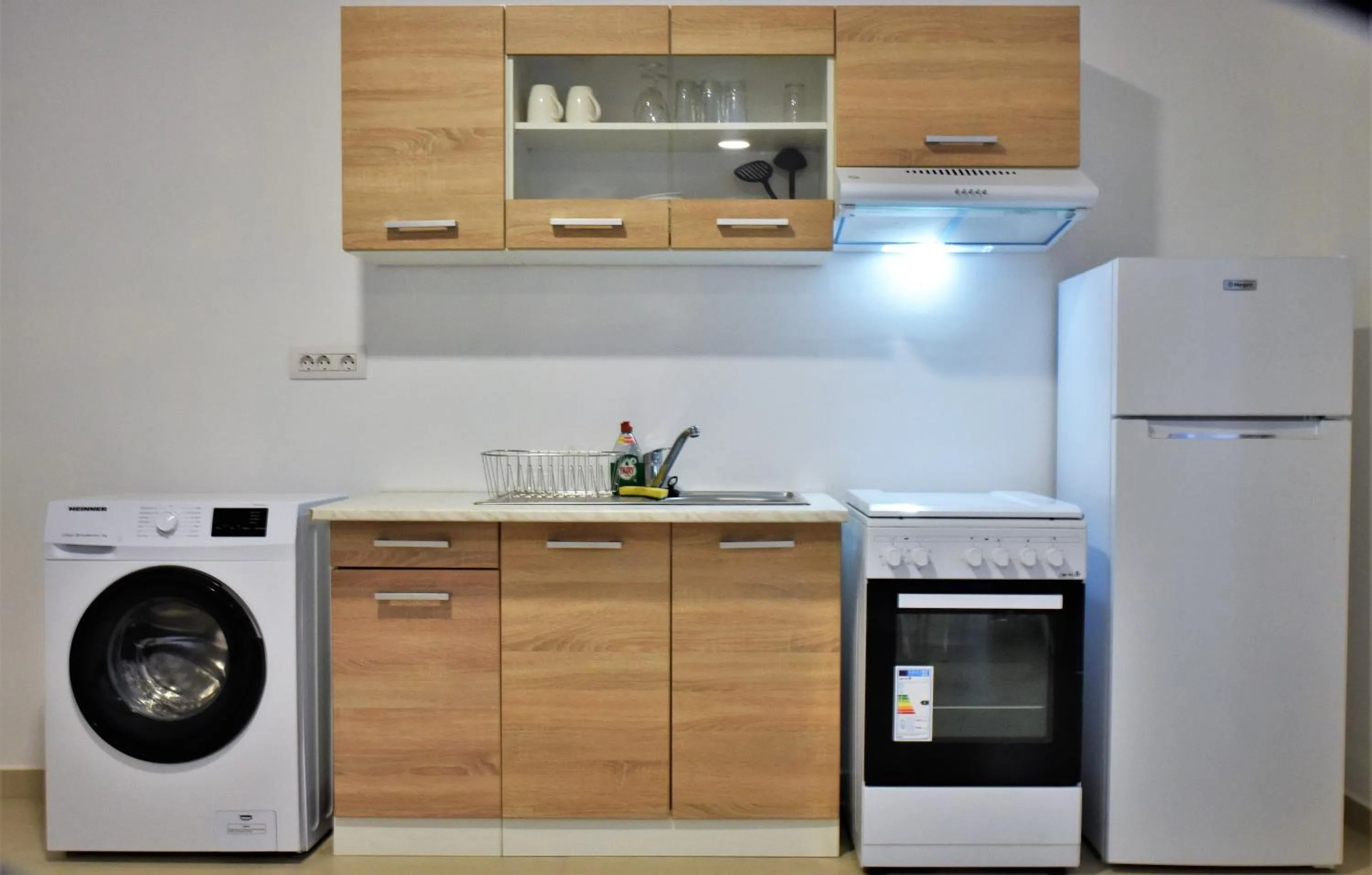 Kitchen or kitchenette in Telhinis Hotel & Apartments