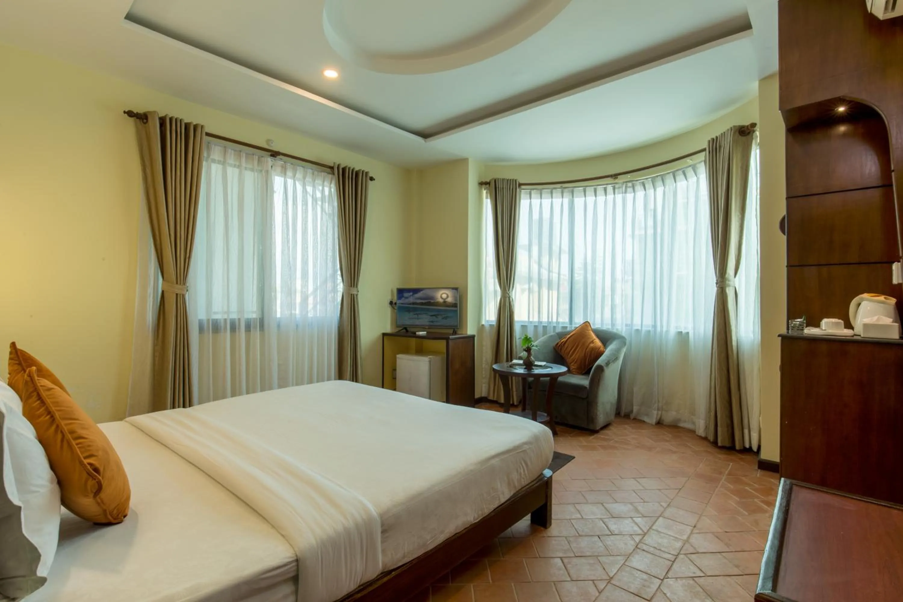 Bed in Dahlia Boutique Hotel