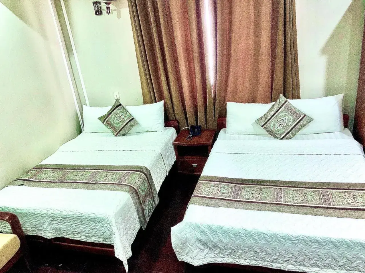 Standard Double Room with Two Double Beds in Holiday Hotel Standard Double Room with Two Double Beds in Holiday Hotel