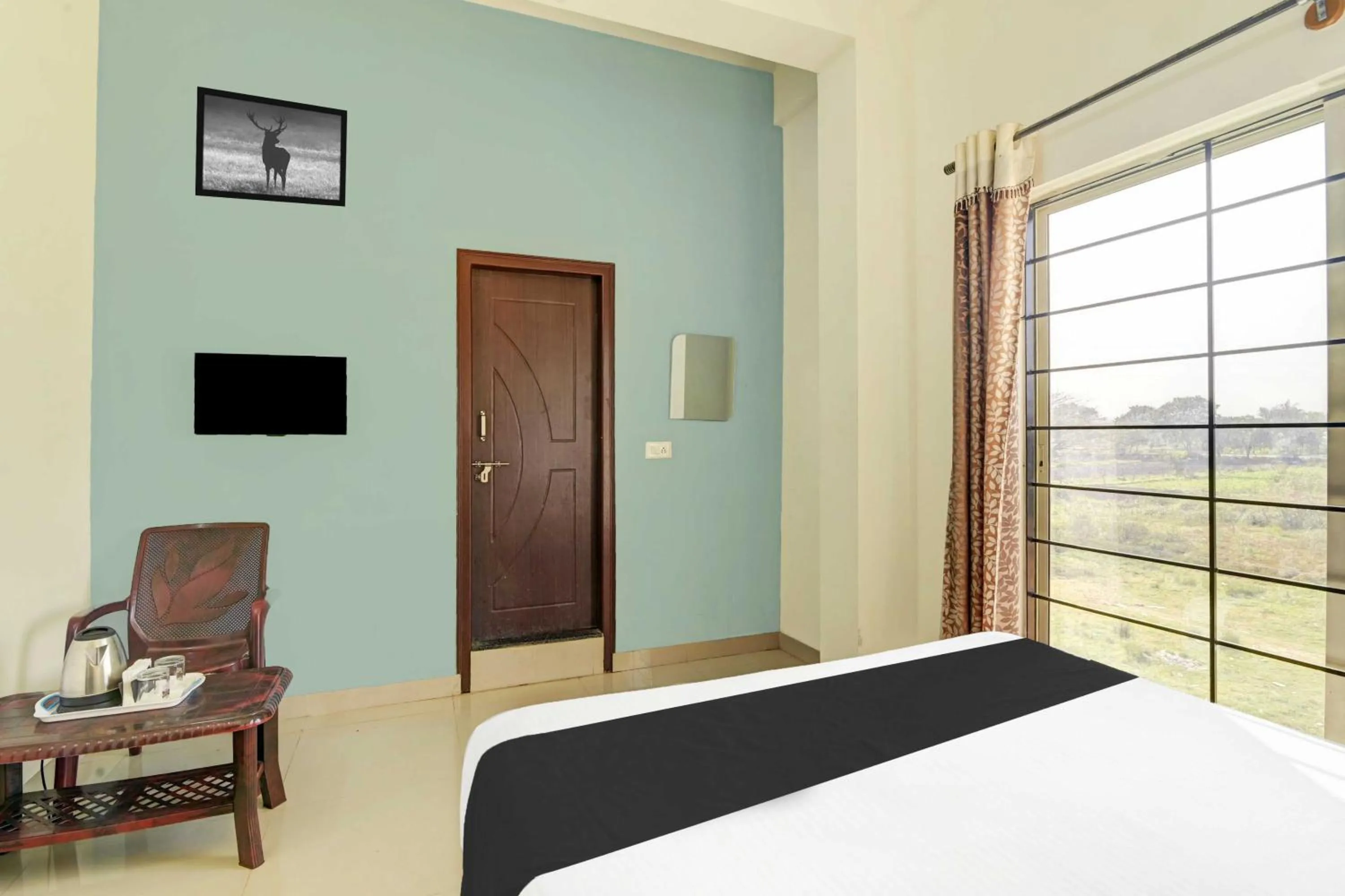 Bedroom, Bed in Hotel O Chikmangaluru Near Railway Station