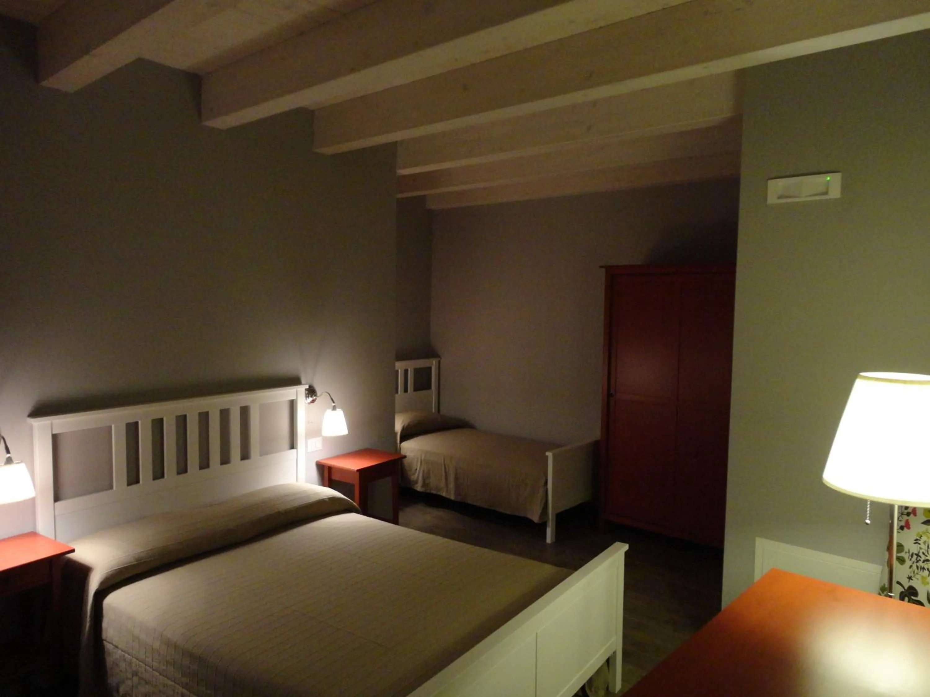 Bedroom in Il Giglio Casa Albergo