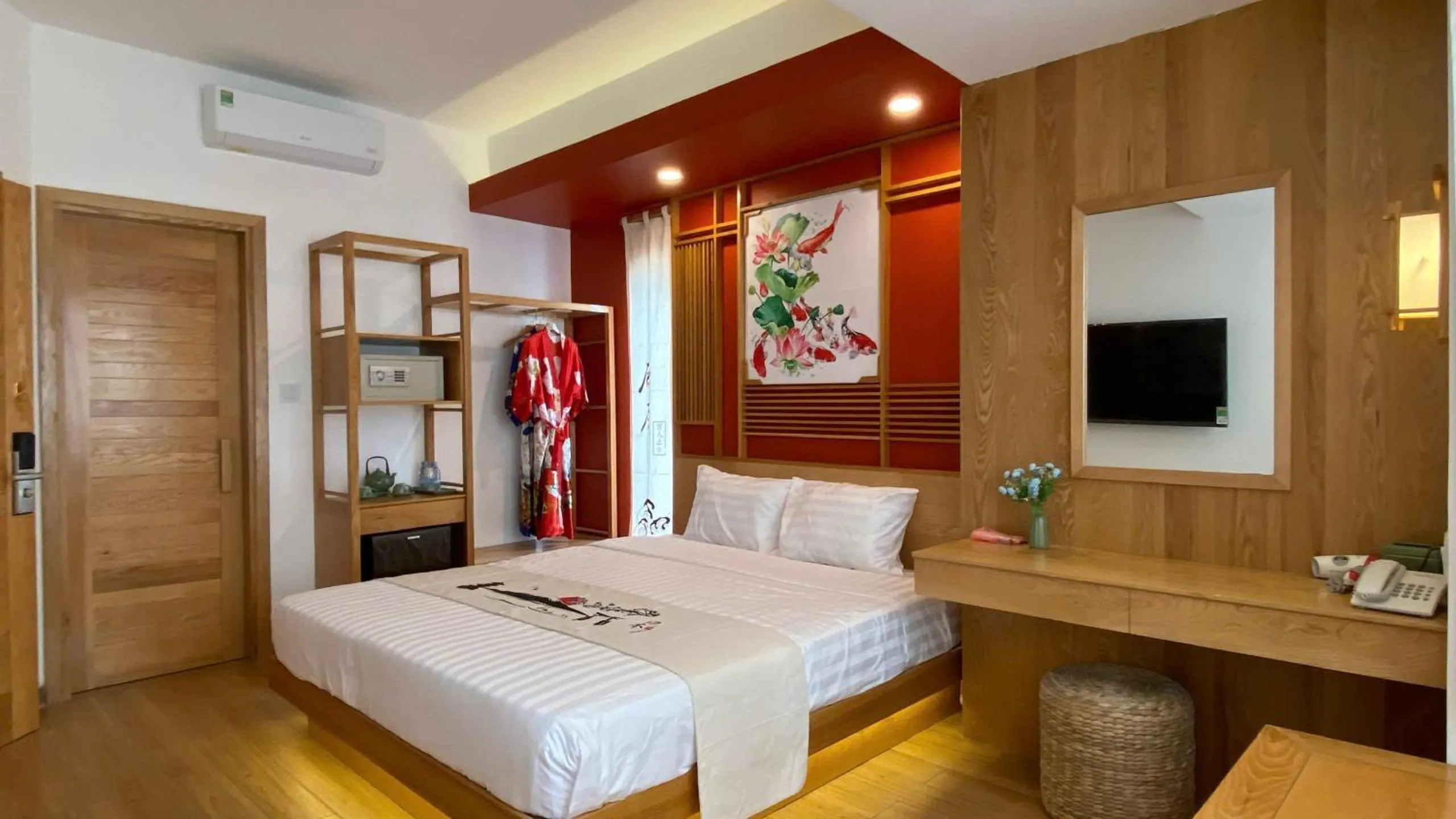 Communal lounge/ TV room, Bed in Fuji Boutique Hotel Nha Trang