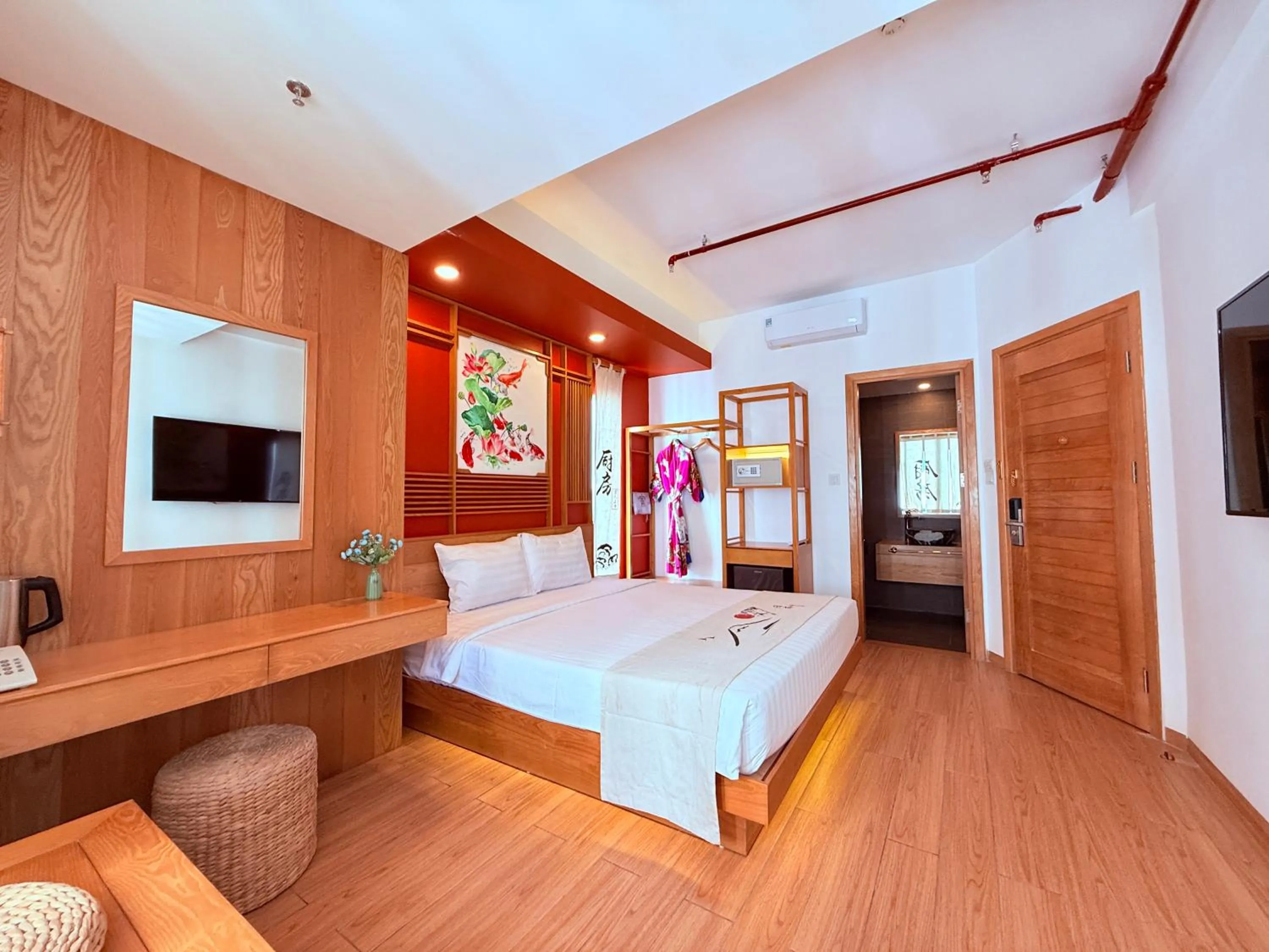 Communal lounge/ TV room, Bed in Fuji Boutique Hotel Nha Trang