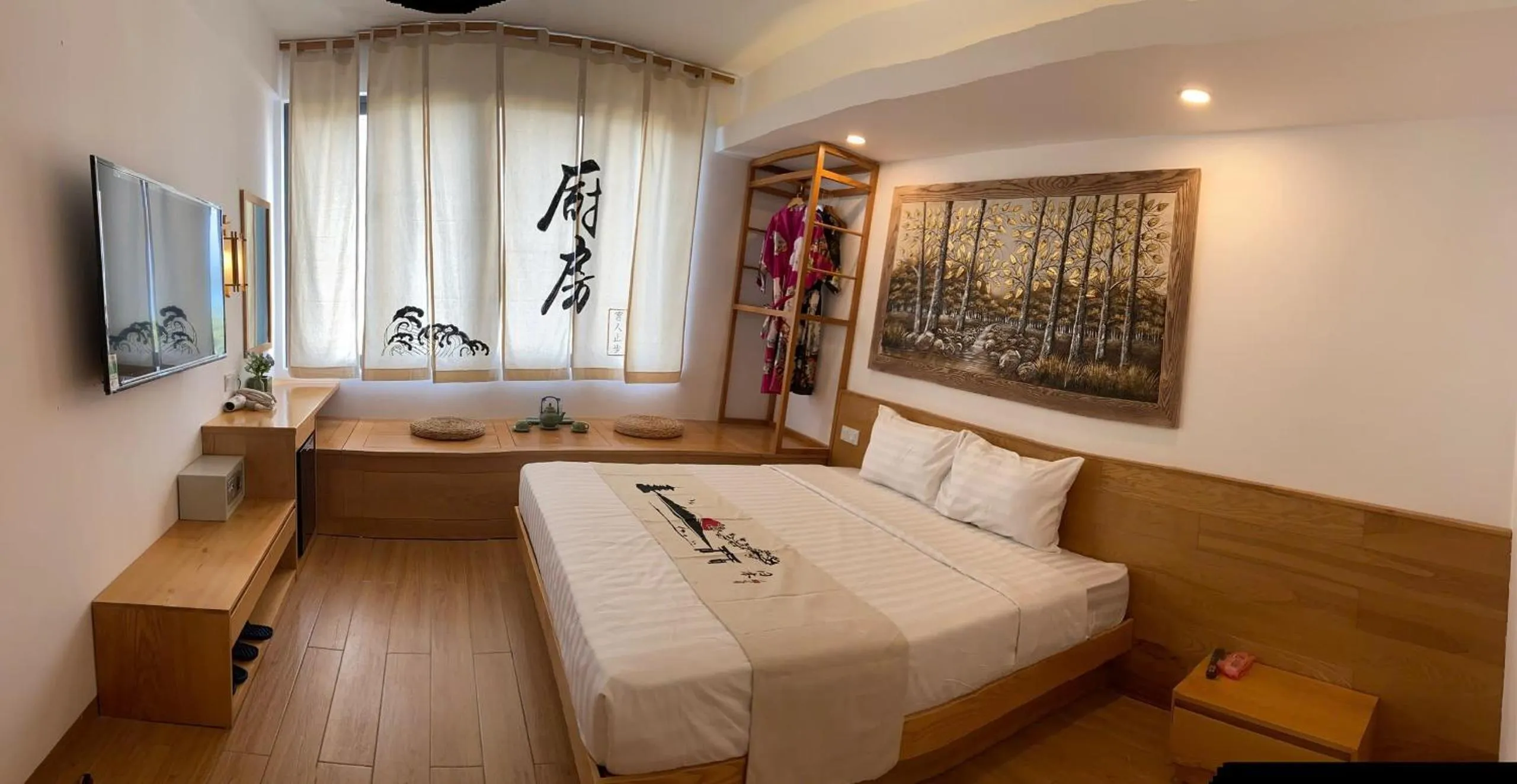 Communal lounge/ TV room, Bed in Fuji Boutique Hotel Nha Trang