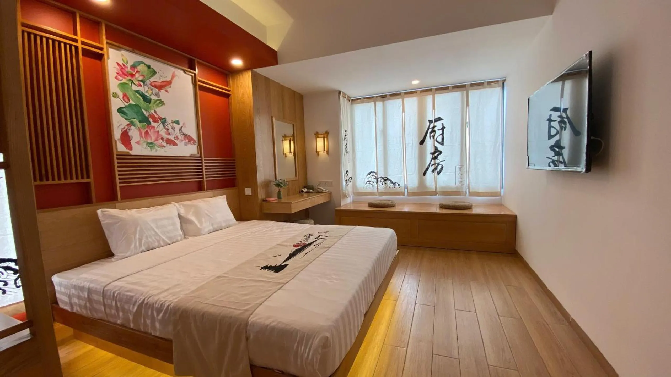 Communal lounge/ TV room, Bed in Fuji Boutique Hotel Nha Trang