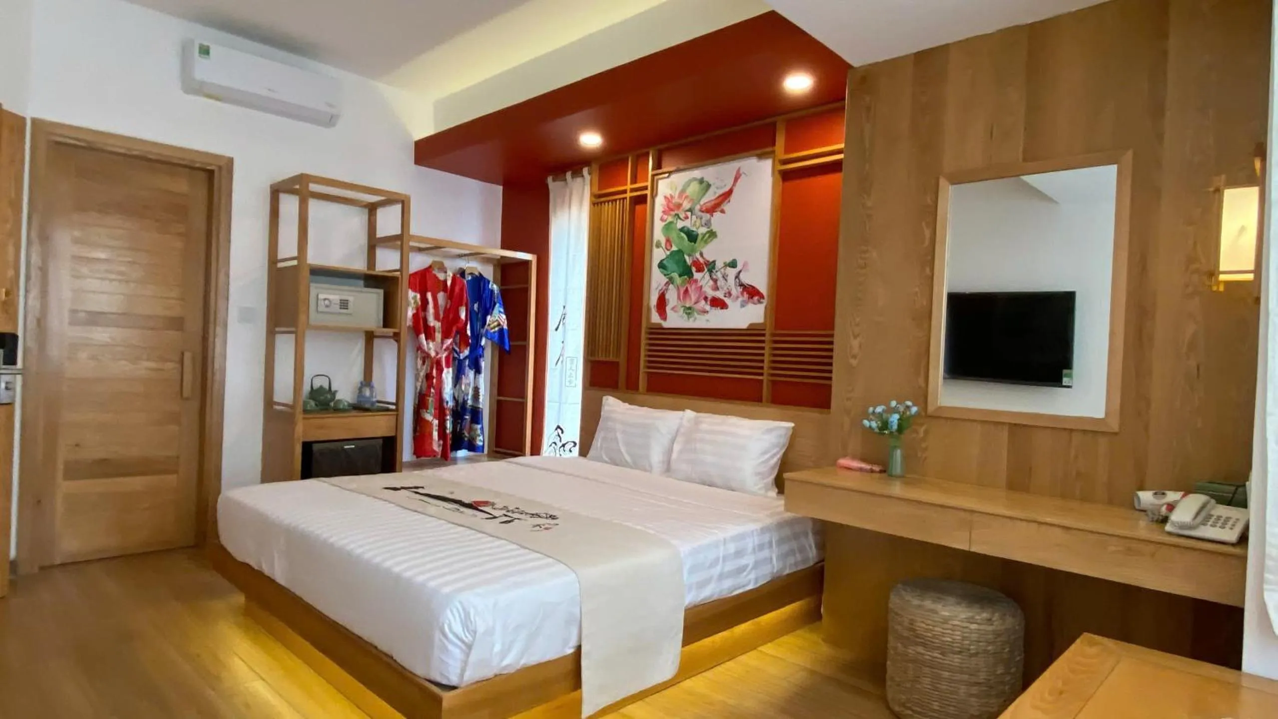 Communal lounge/ TV room, Bed in Fuji Boutique Hotel Nha Trang