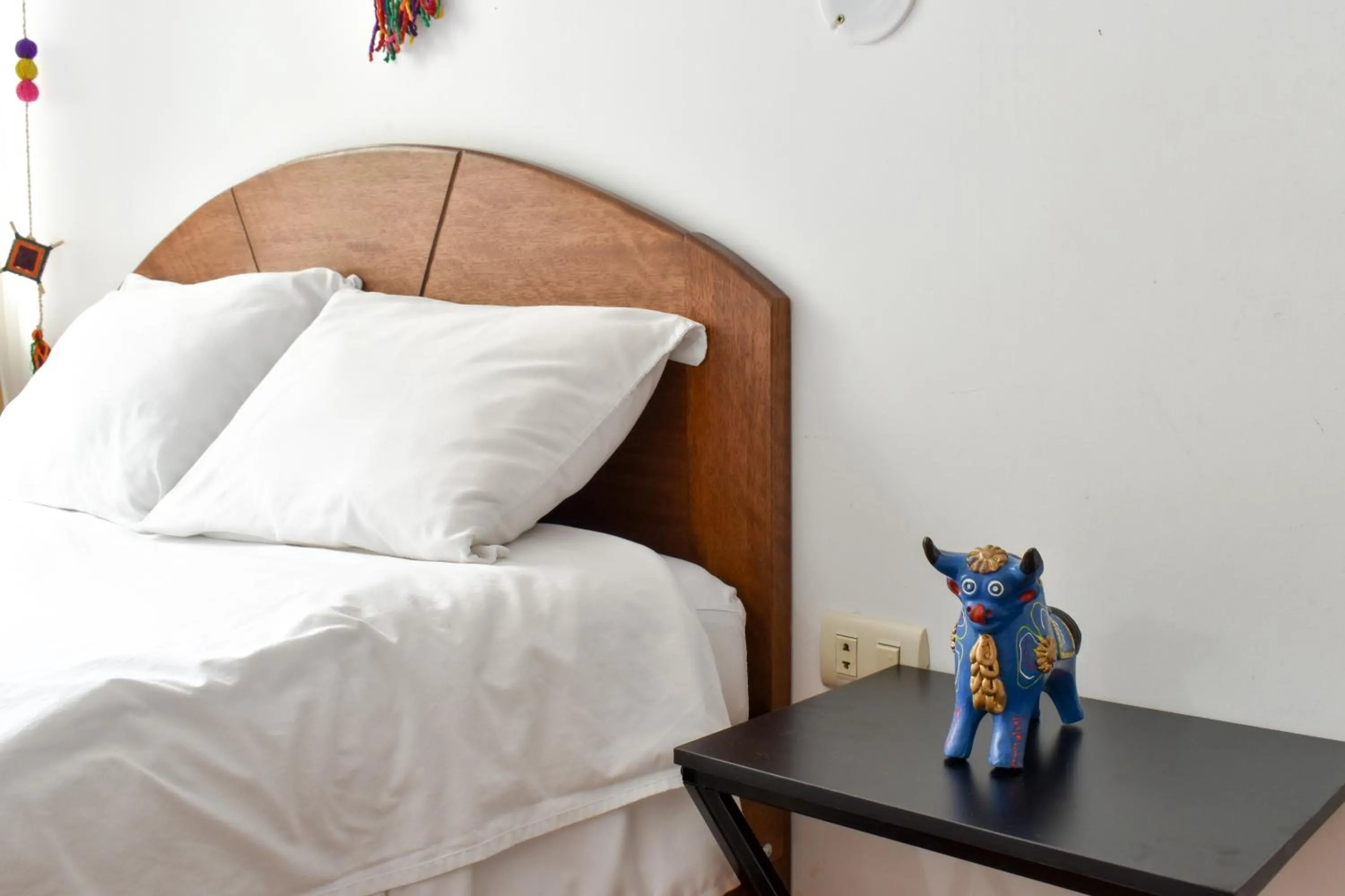 Bed in Apart Hotel El Puma