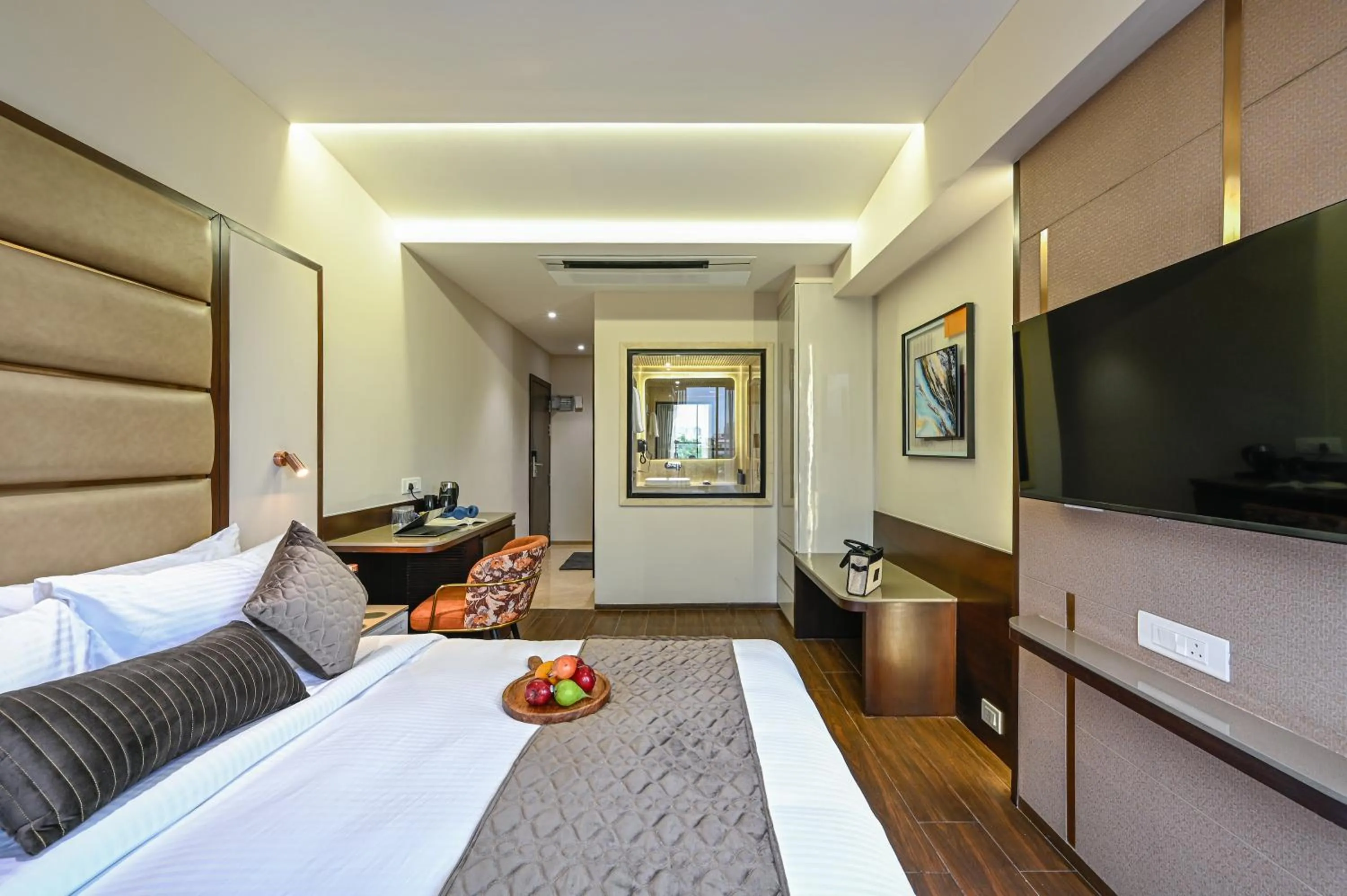 Bed in Hotel Grand Girdhar Premier