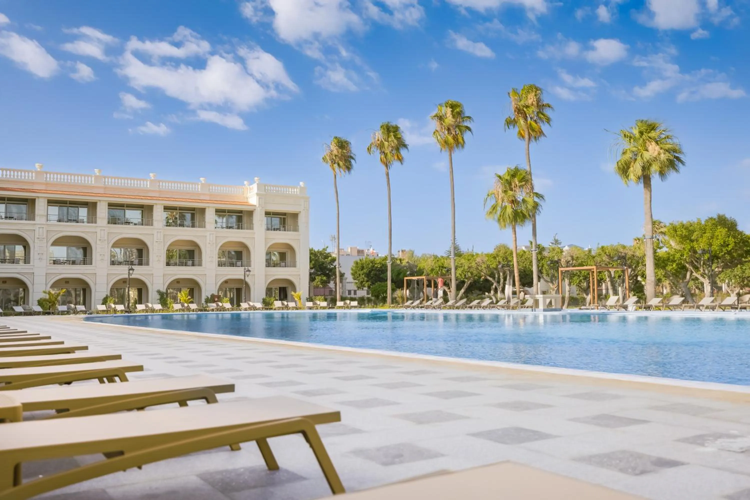 Swimming pool in Helnan Antoniades Palace Hotel