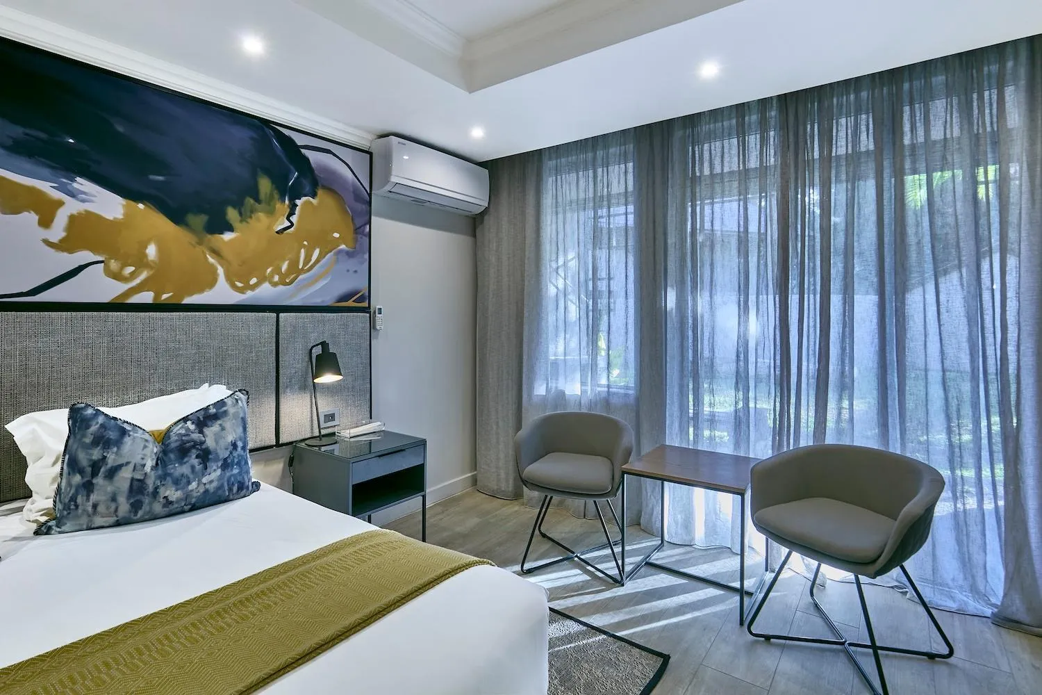 Seating area, Bed in Cresta Thapama Hotel