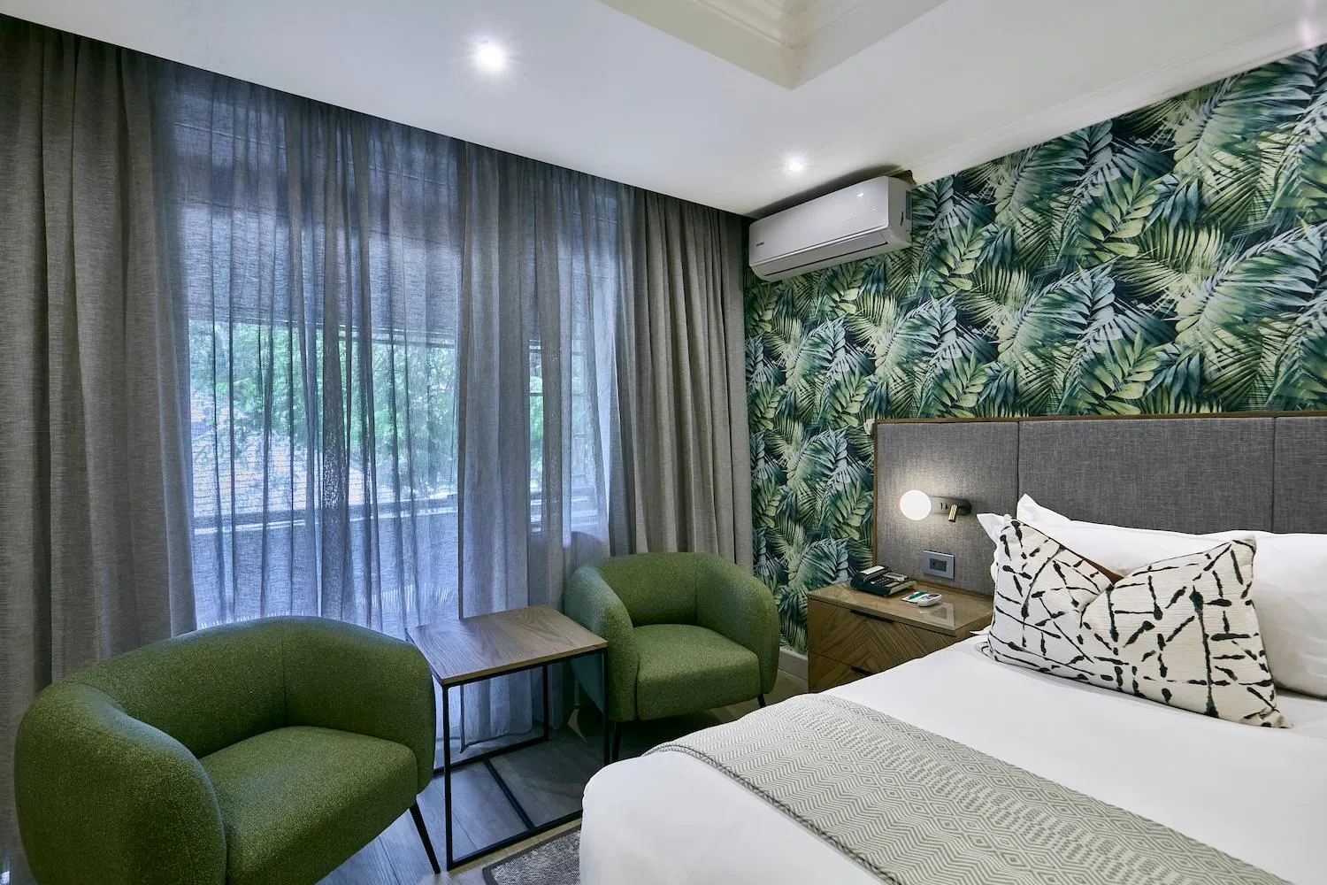 Seating area, Bed in Cresta Thapama Hotel