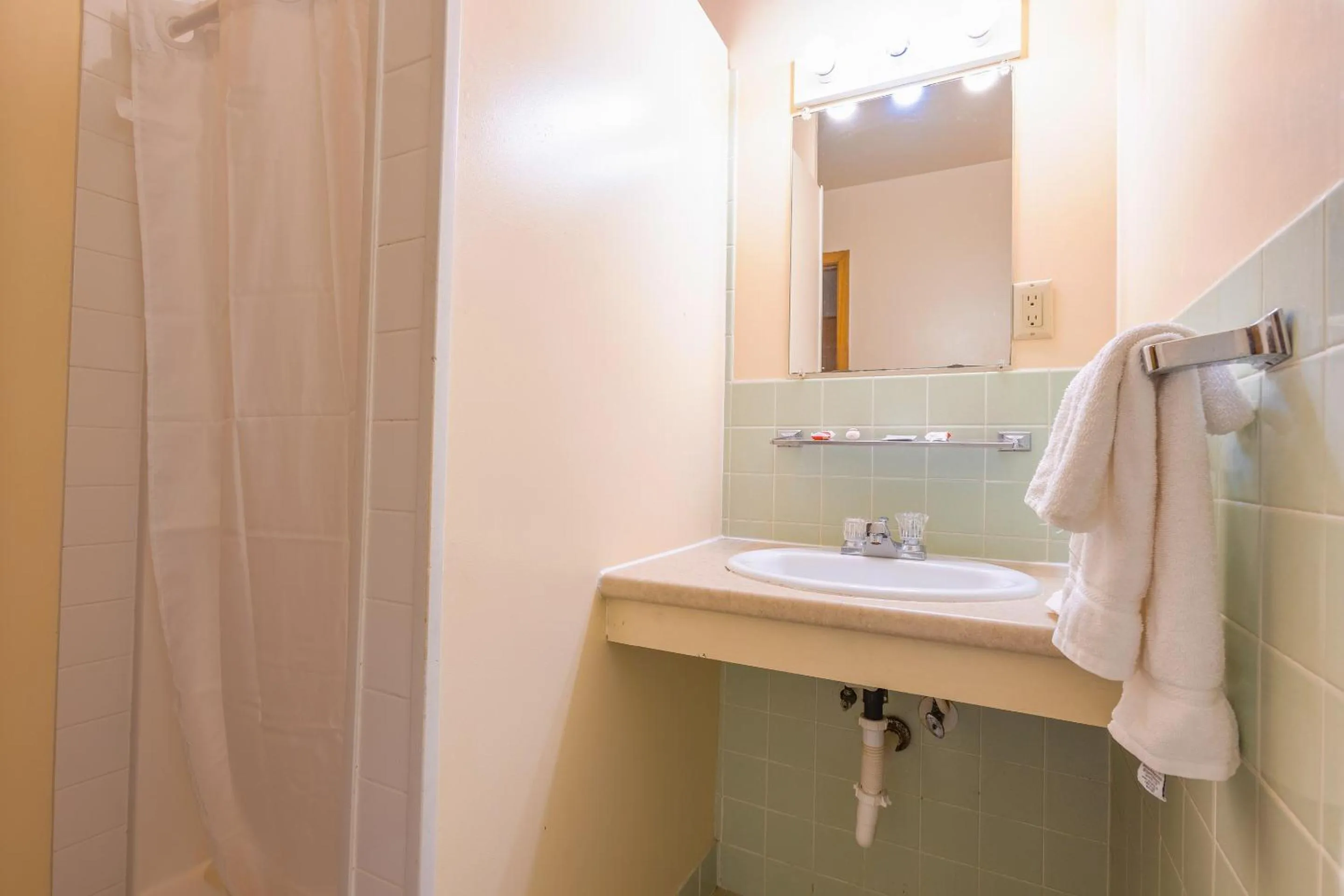 Bathroom in Parkside Motel by OYO Meadville Conneaut Lake