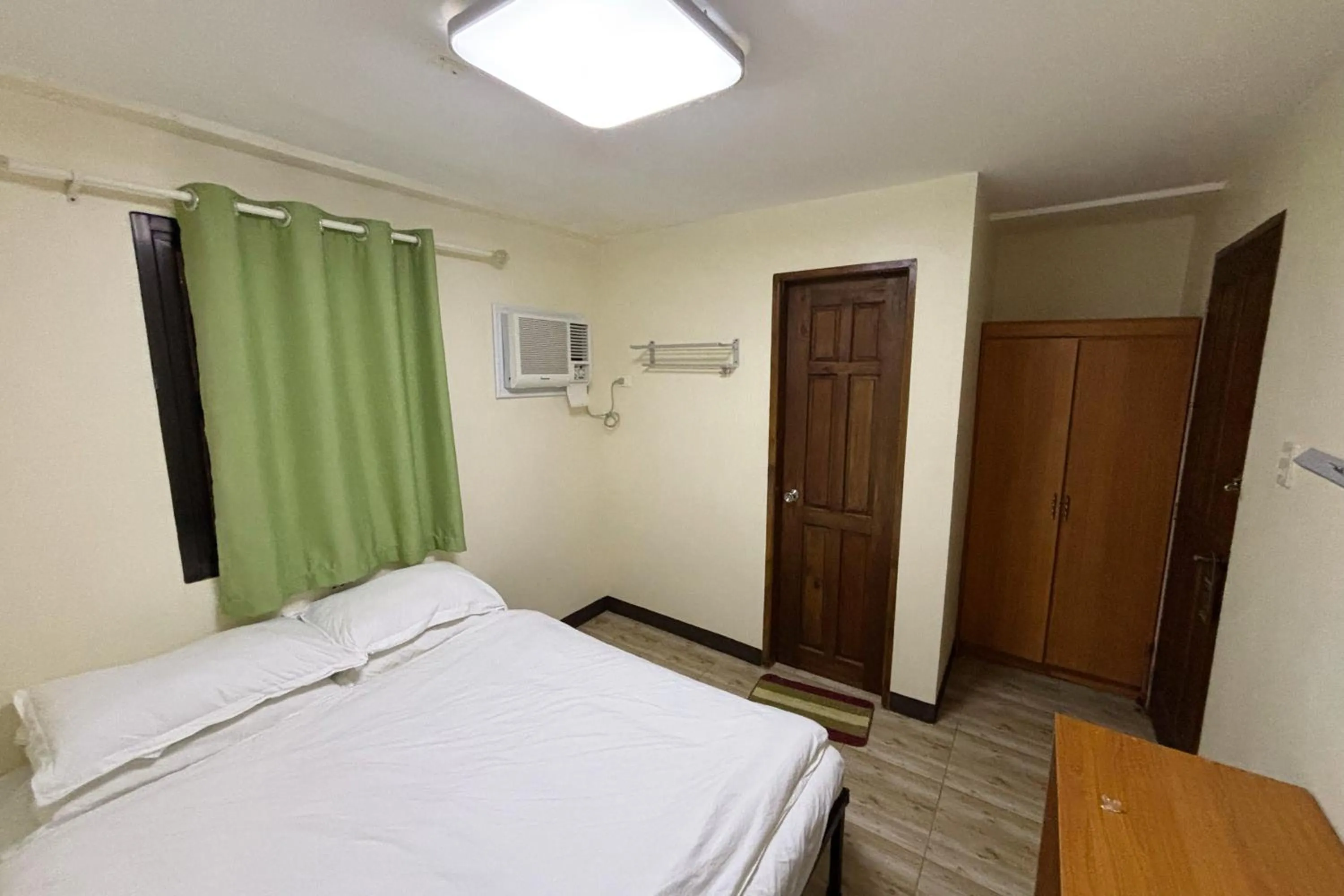 Bed in Pink Ocean Diving Resort Sabang Puerto Galera