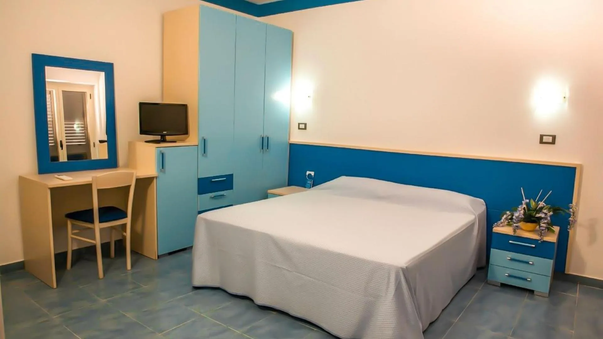 Bedroom in Villaggio & Residence Club Aquilia