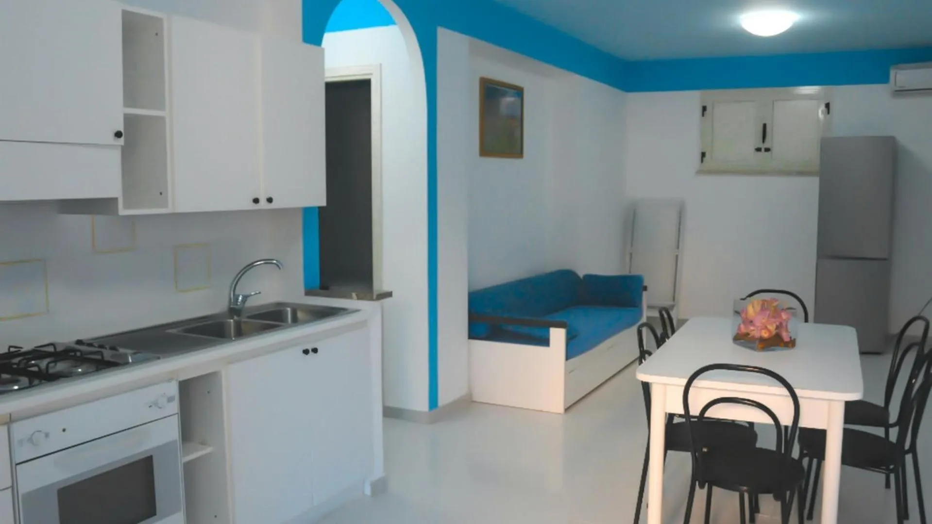 Living room, Kitchen/Kitchenette in Villaggio & Residence Club Aquilia