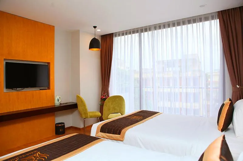 Bed in Dragon Sea Hotel