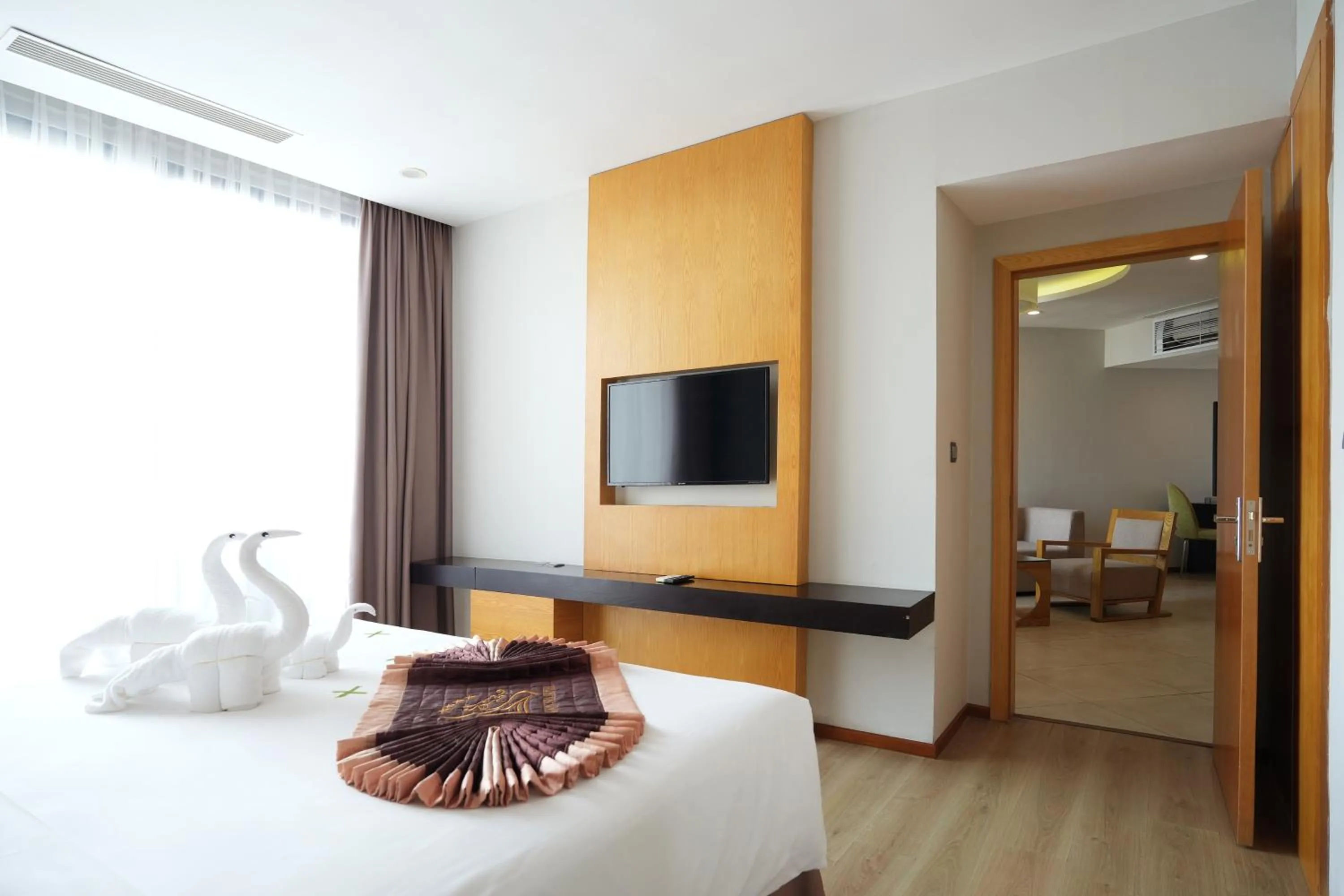 Bed in Dragon Sea Hotel