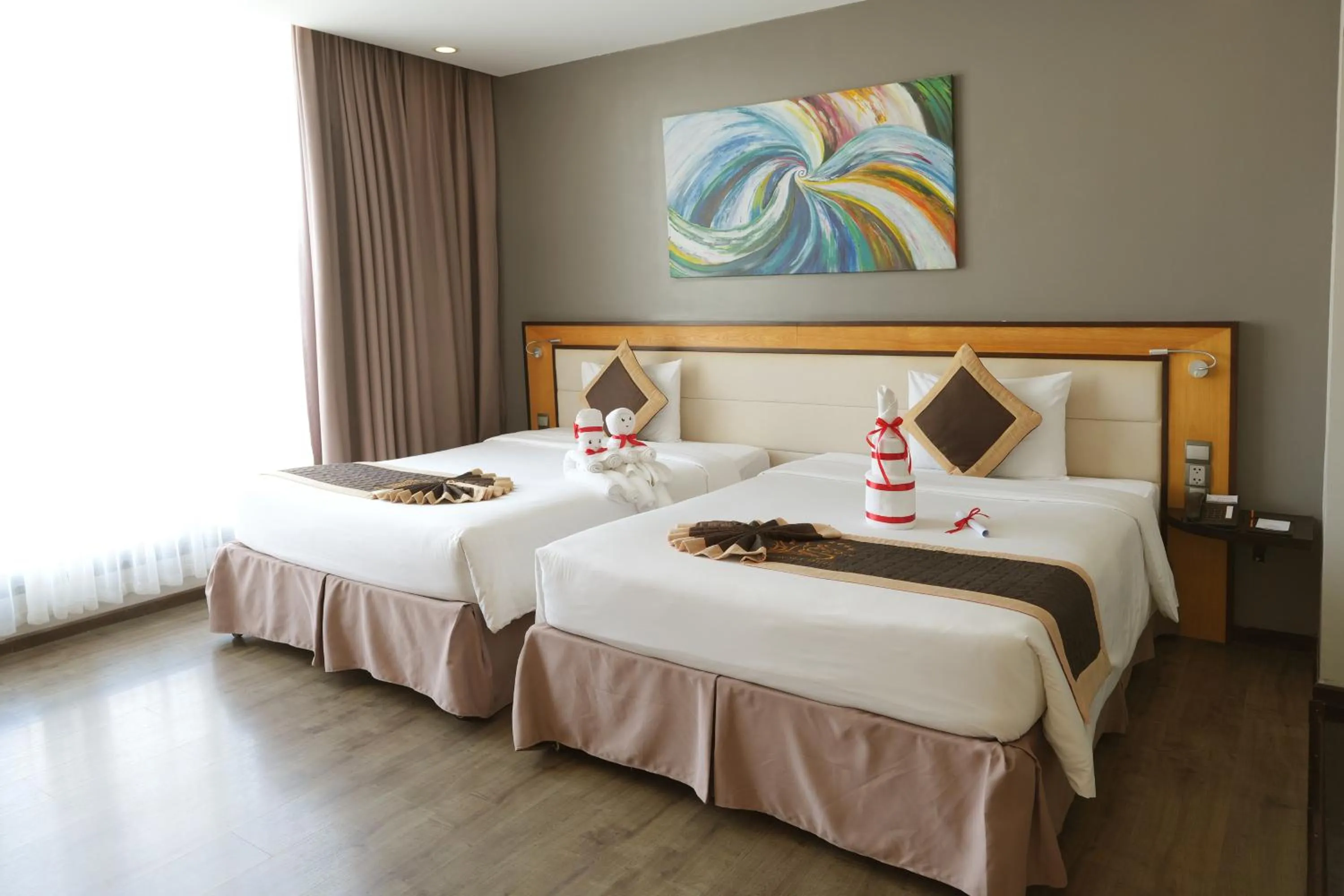 Bed in Dragon Sea Hotel