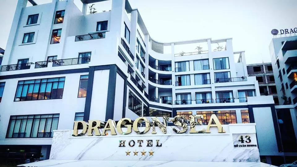 Property logo or sign in Dragon Sea Hotel