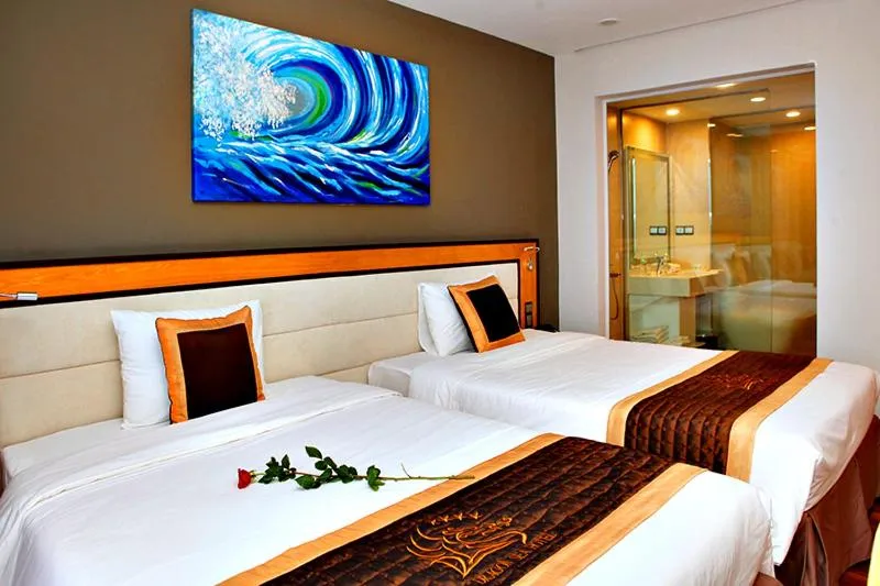 Bed in Dragon Sea Hotel