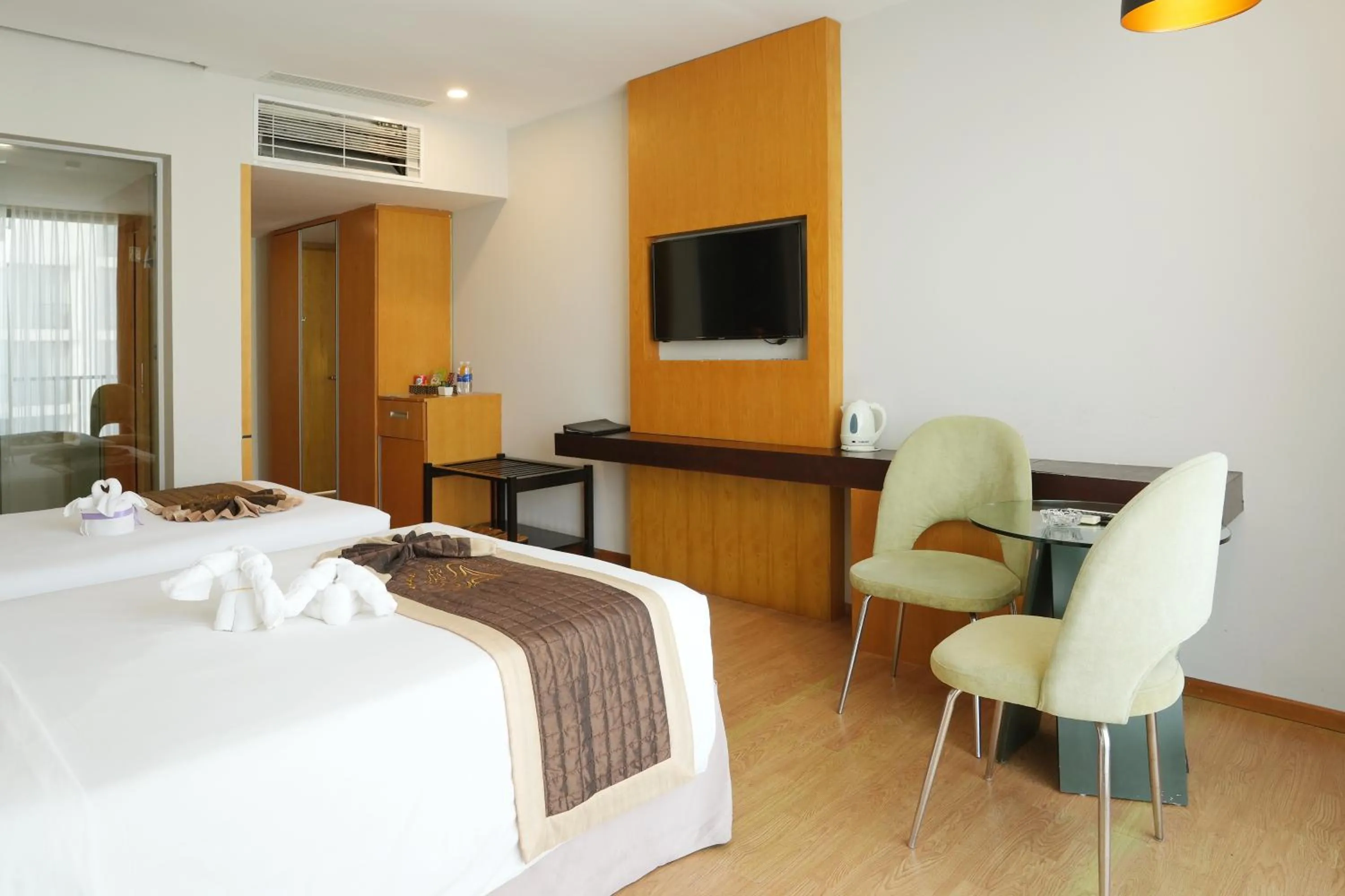 Bed in Dragon Sea Hotel