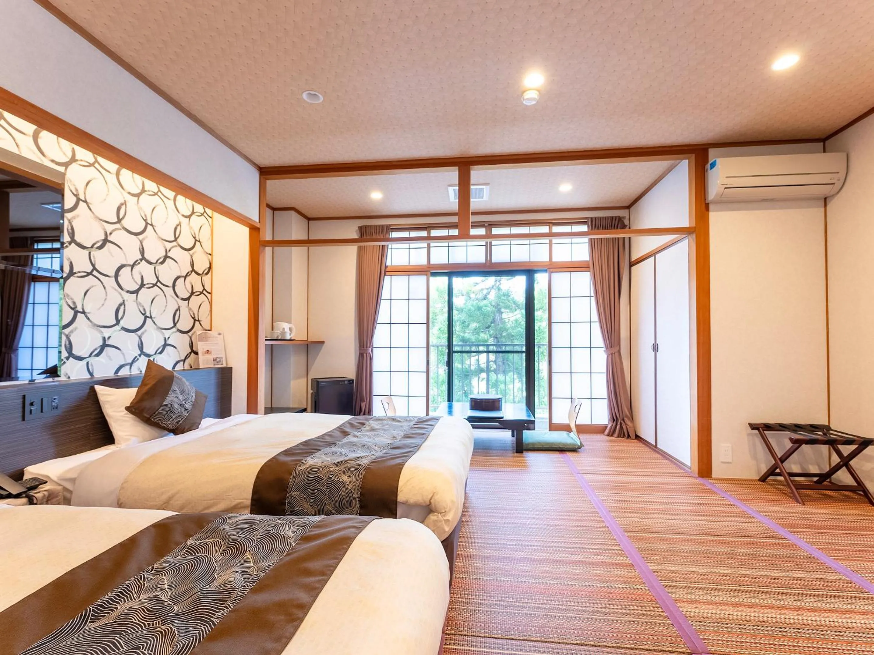 Bed in Livemax Resort Yuhigaura Kitu Onsen
