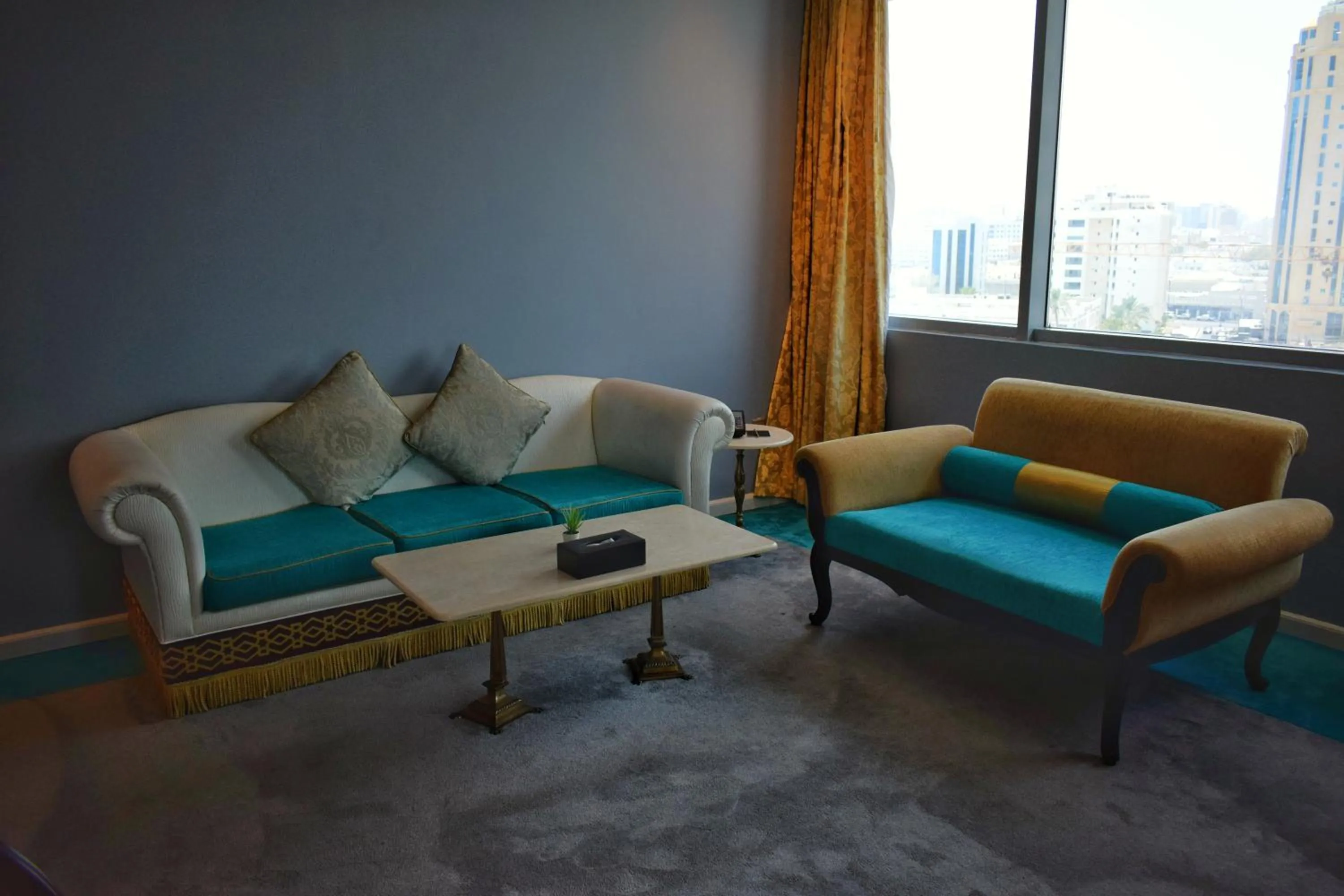 Living room in Saraya Corniche Hotel