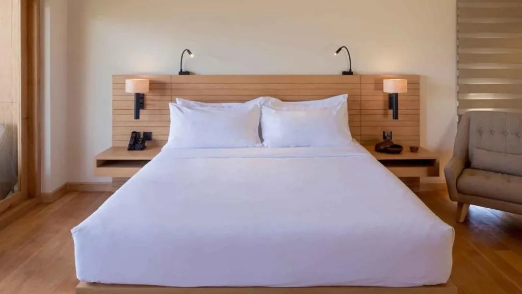 Bed in Dhensa Resort