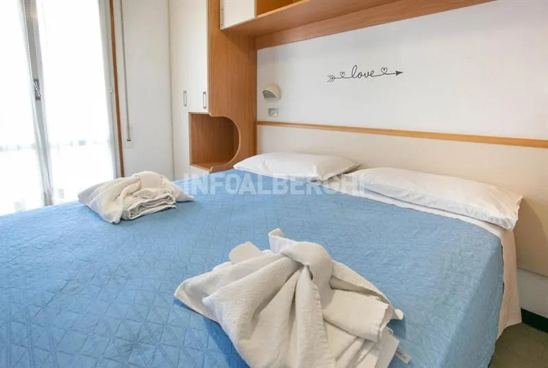 Bed in Hotel Paradiso