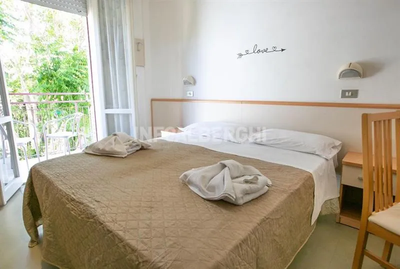 Bed in Hotel Paradiso