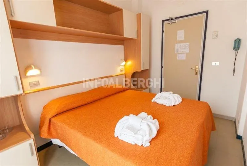 Bed in Hotel Paradiso