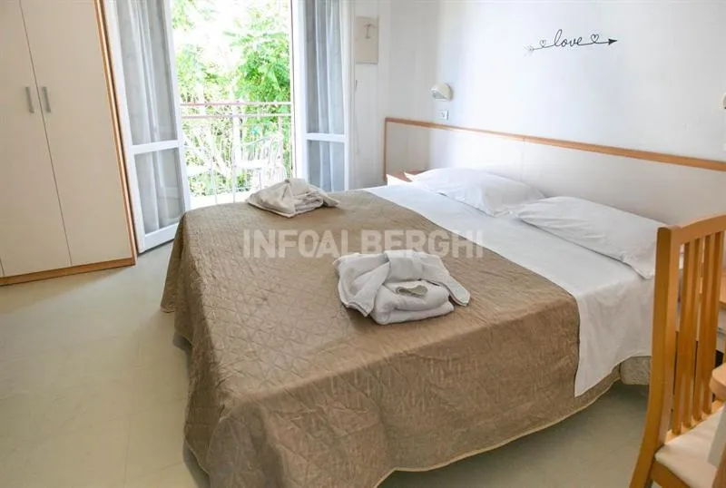 Bed in Hotel Paradiso