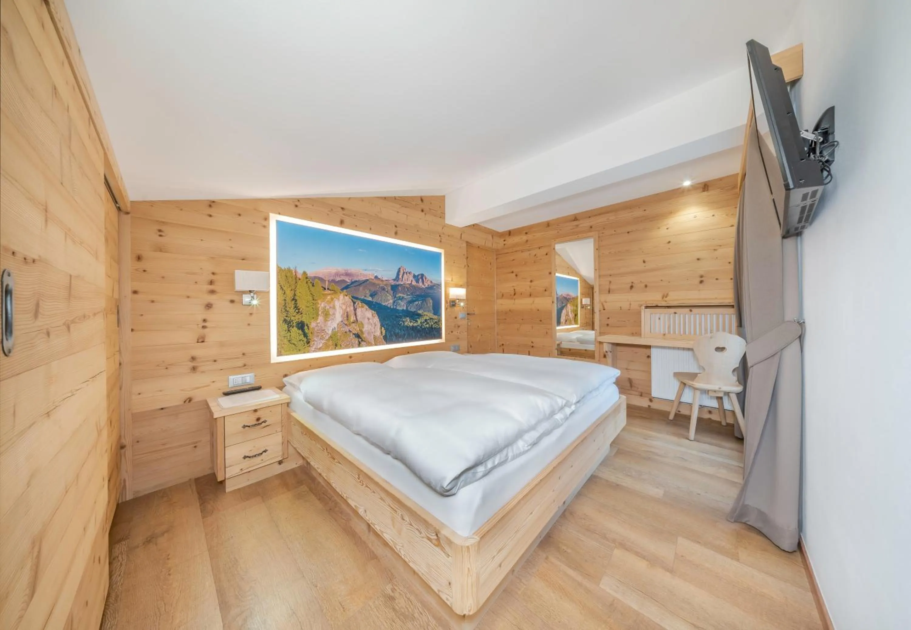 Photo of the whole room, Bed in Garni Tramans