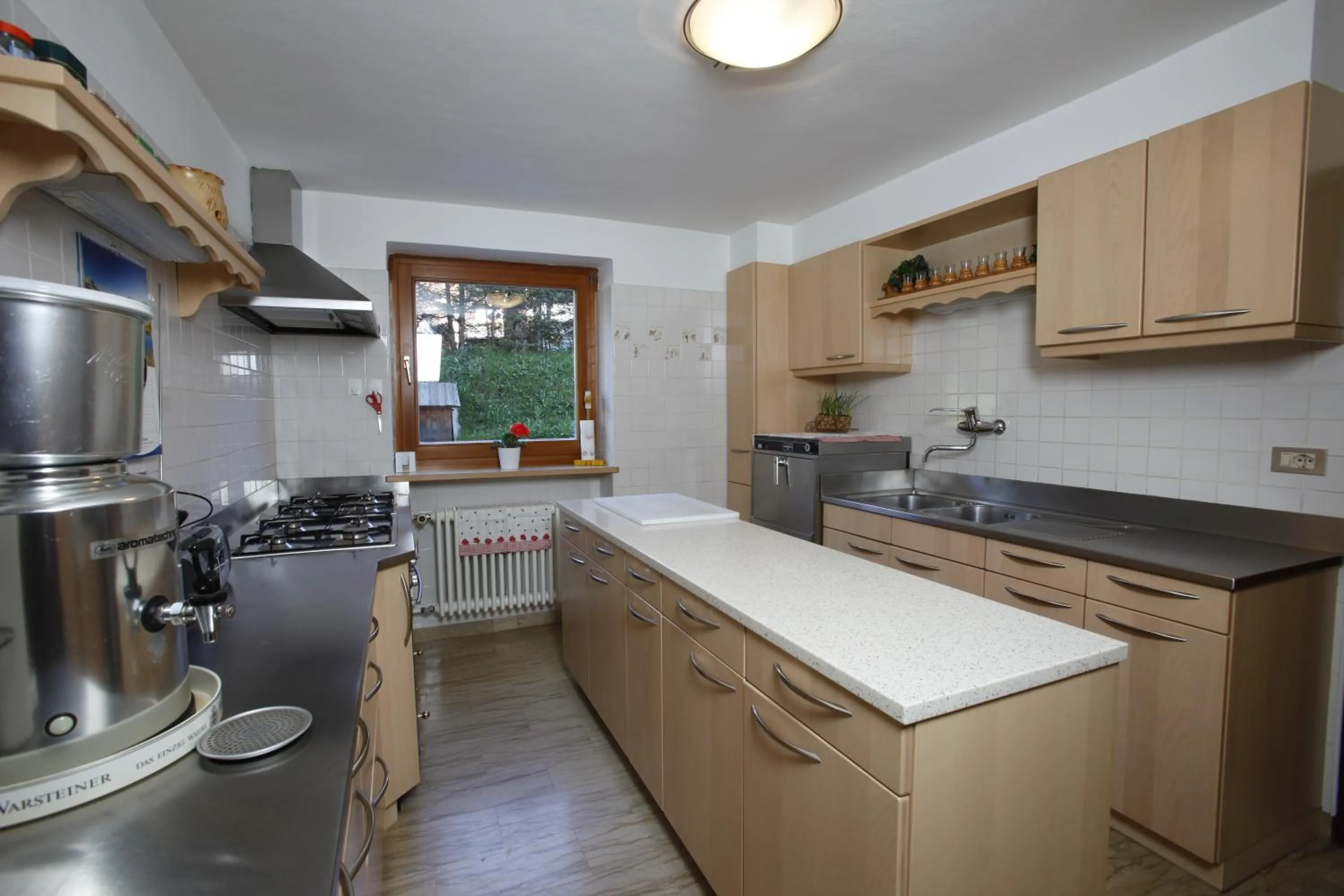 Kitchen or kitchenette in Garni Tramans