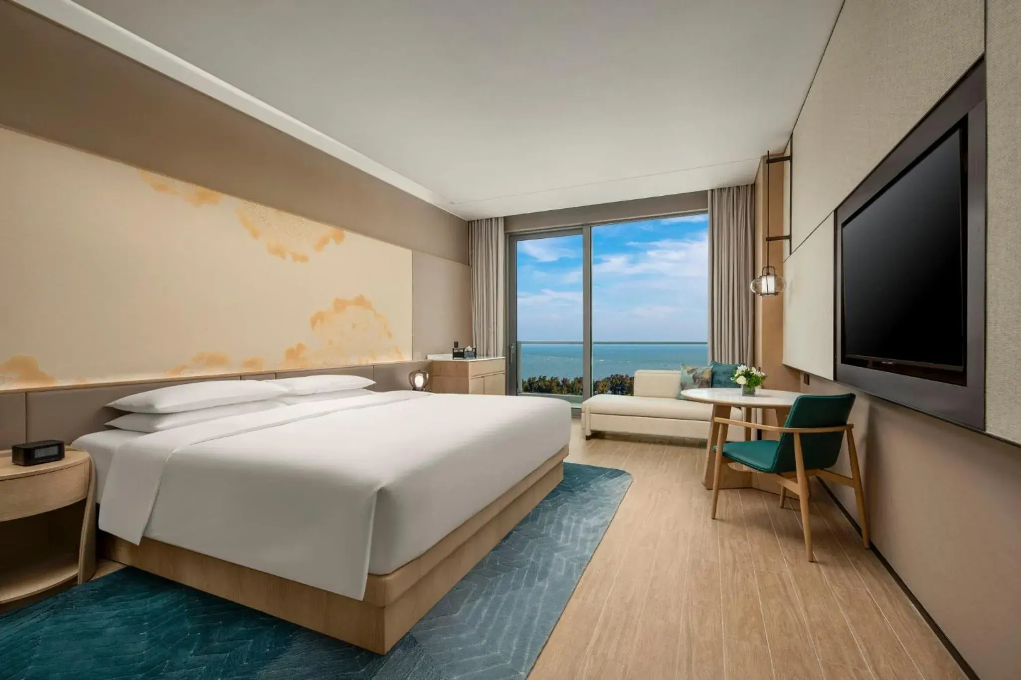 Premium King Room with Balcony and Ocean View in HUALUXE Beihai Silver Beach Resort by IHG Premium King Room with Balcony and Ocean View in HUALUXE Beihai Silver Beach Resort by IHG