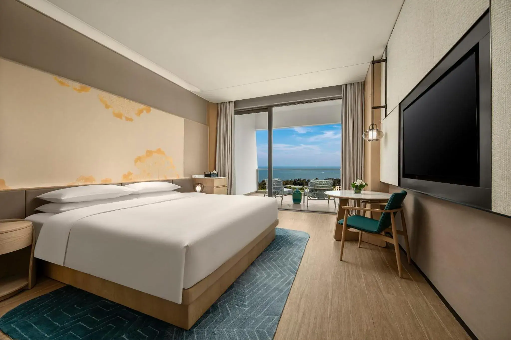 Premium King Room with Oceanfront and Furnished Balcony in HUALUXE Beihai Silver Beach Resort by IHG Premium King Room with Oceanfront and Furnished Balcony in HUALUXE Beihai Silver Beach Resort by IHG