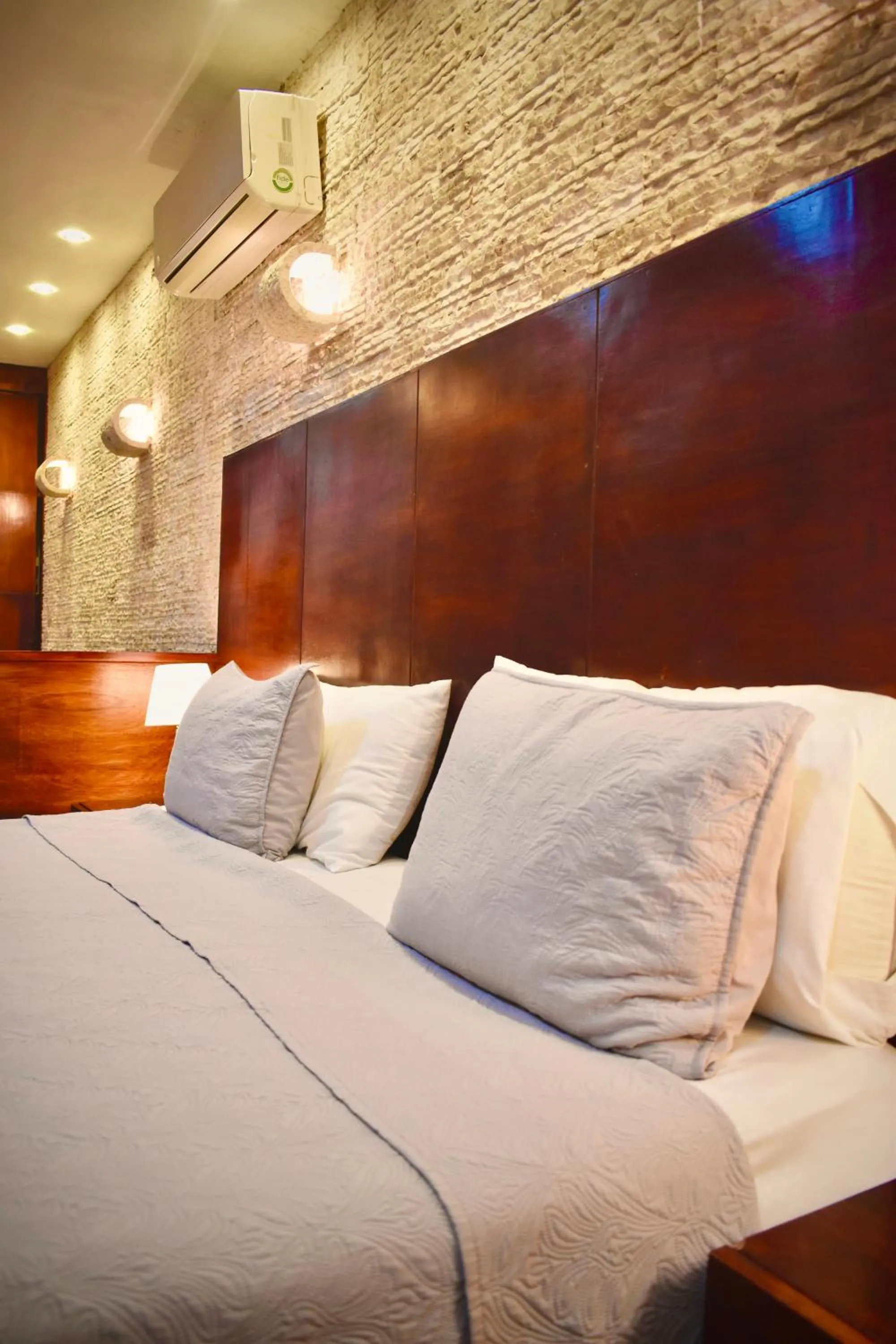 Bed in El Zaguán Colonial by GuruHotel