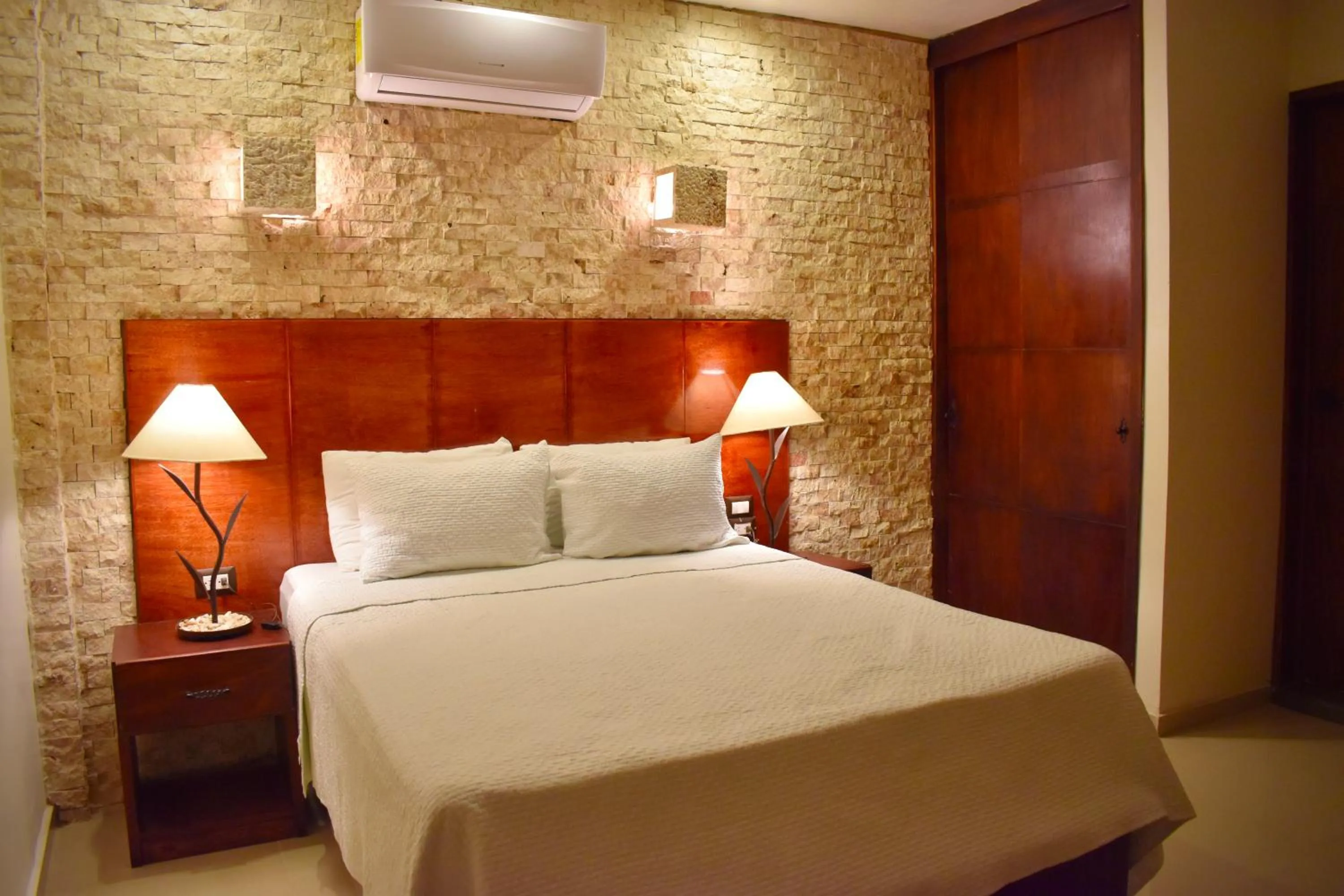 Bed in El Zaguán Colonial by GuruHotel