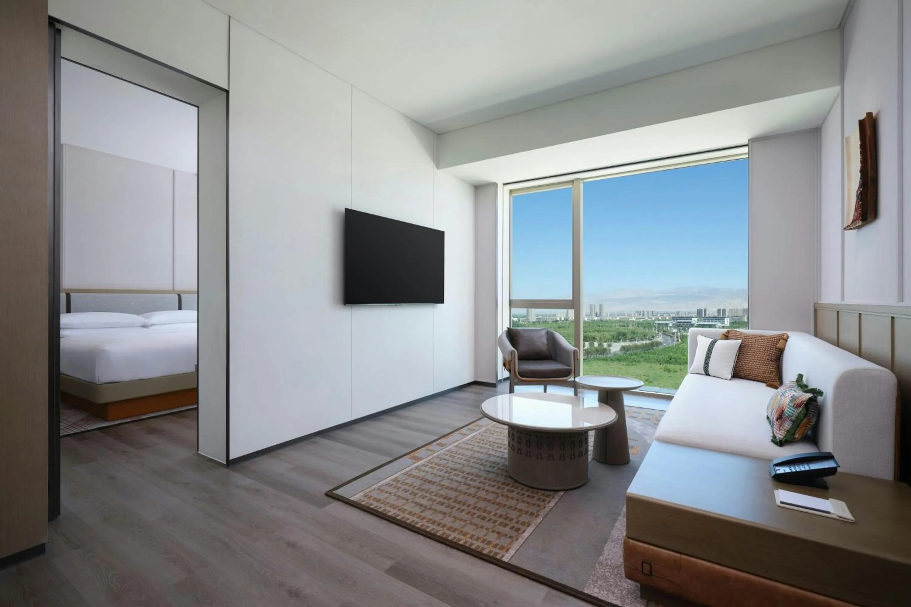 Living room, Bed in Courtyard by Marriott Korla