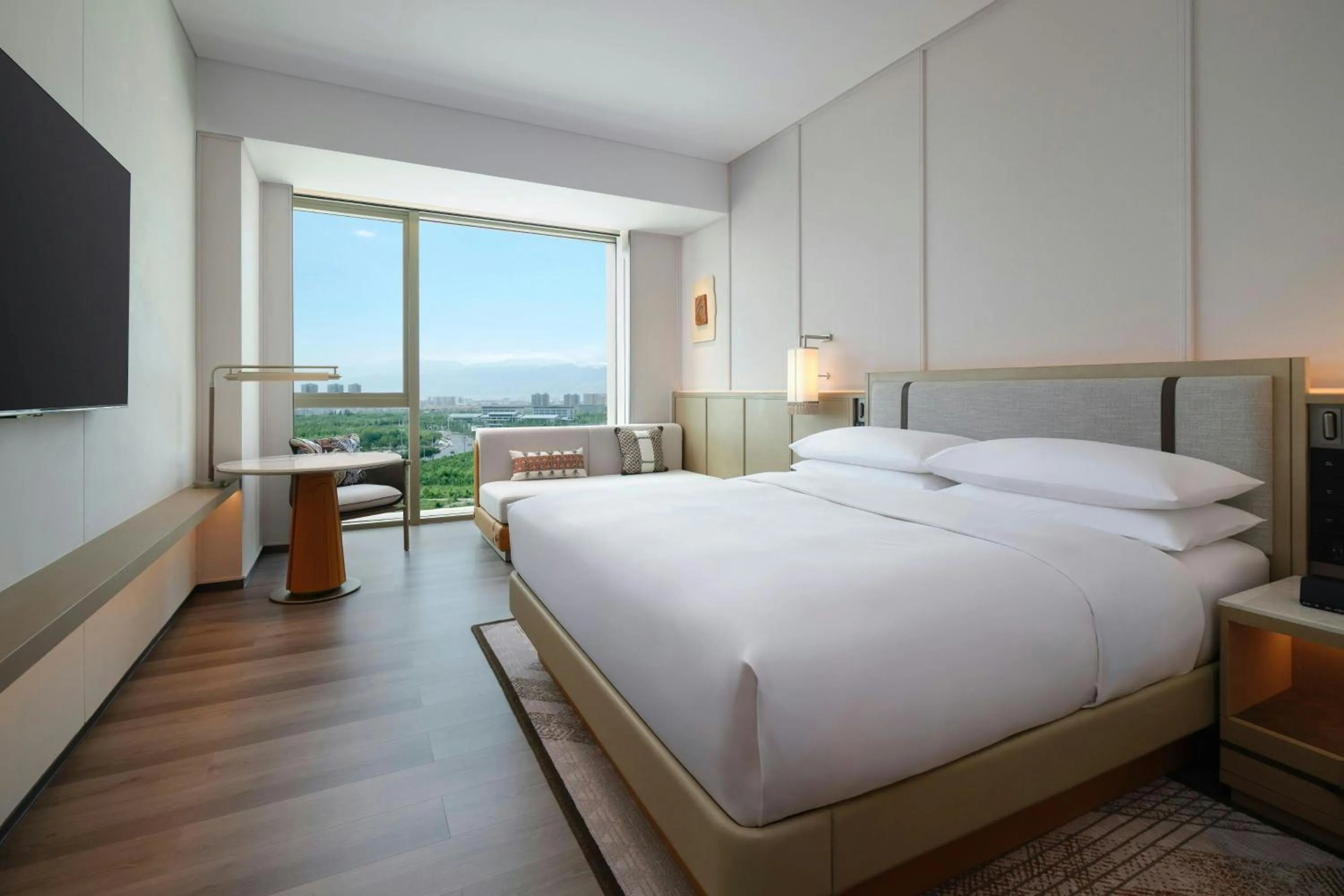 Photo of the whole room, Bed in Courtyard by Marriott Korla