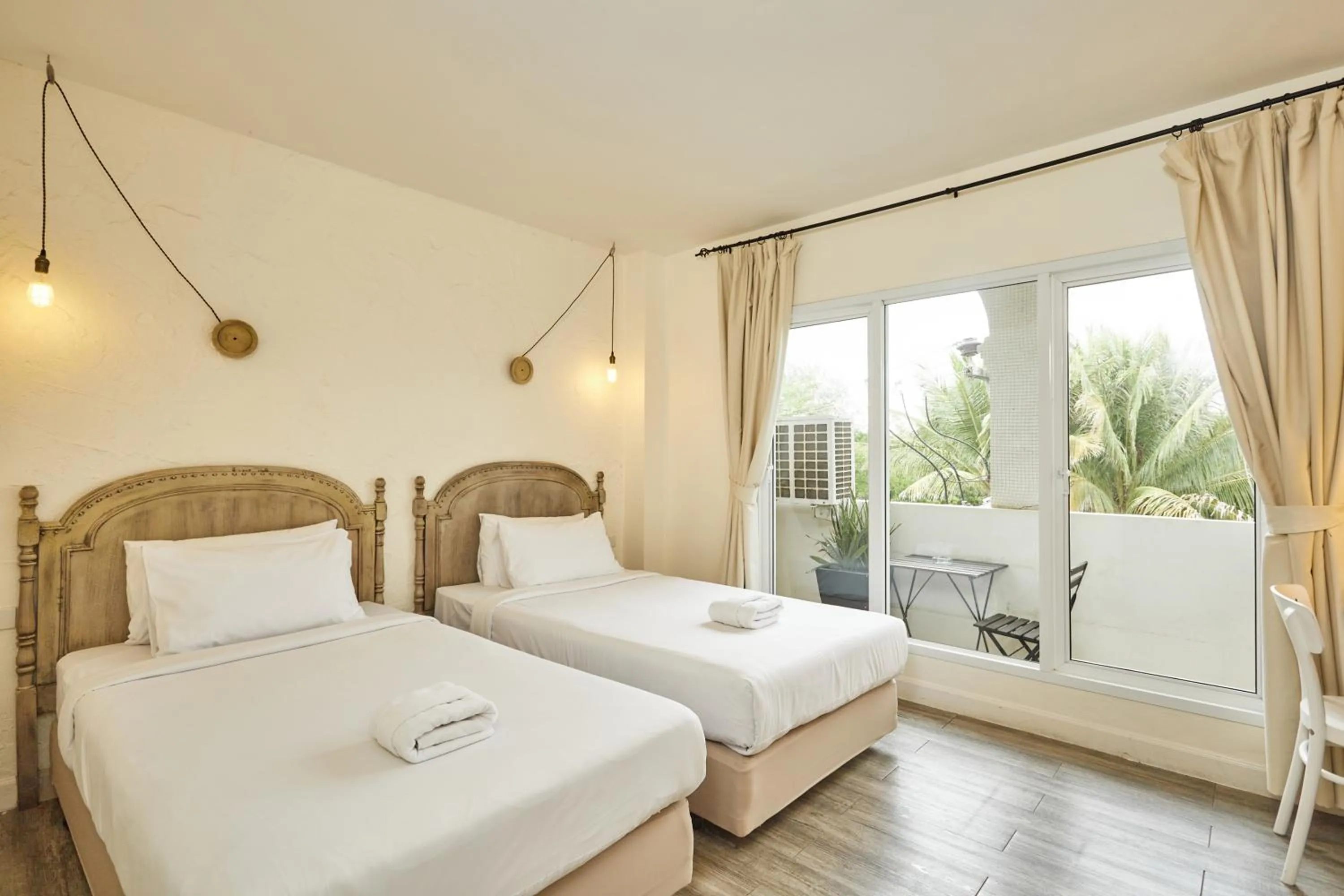 Bed in Talay Hotel and Villa Cha-am