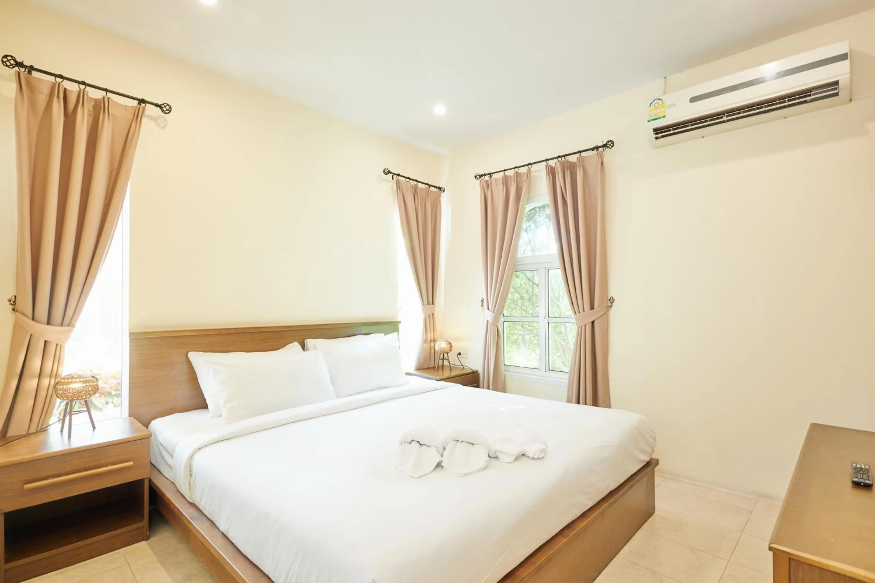 Bed in Talay Hotel and Villa Cha-am